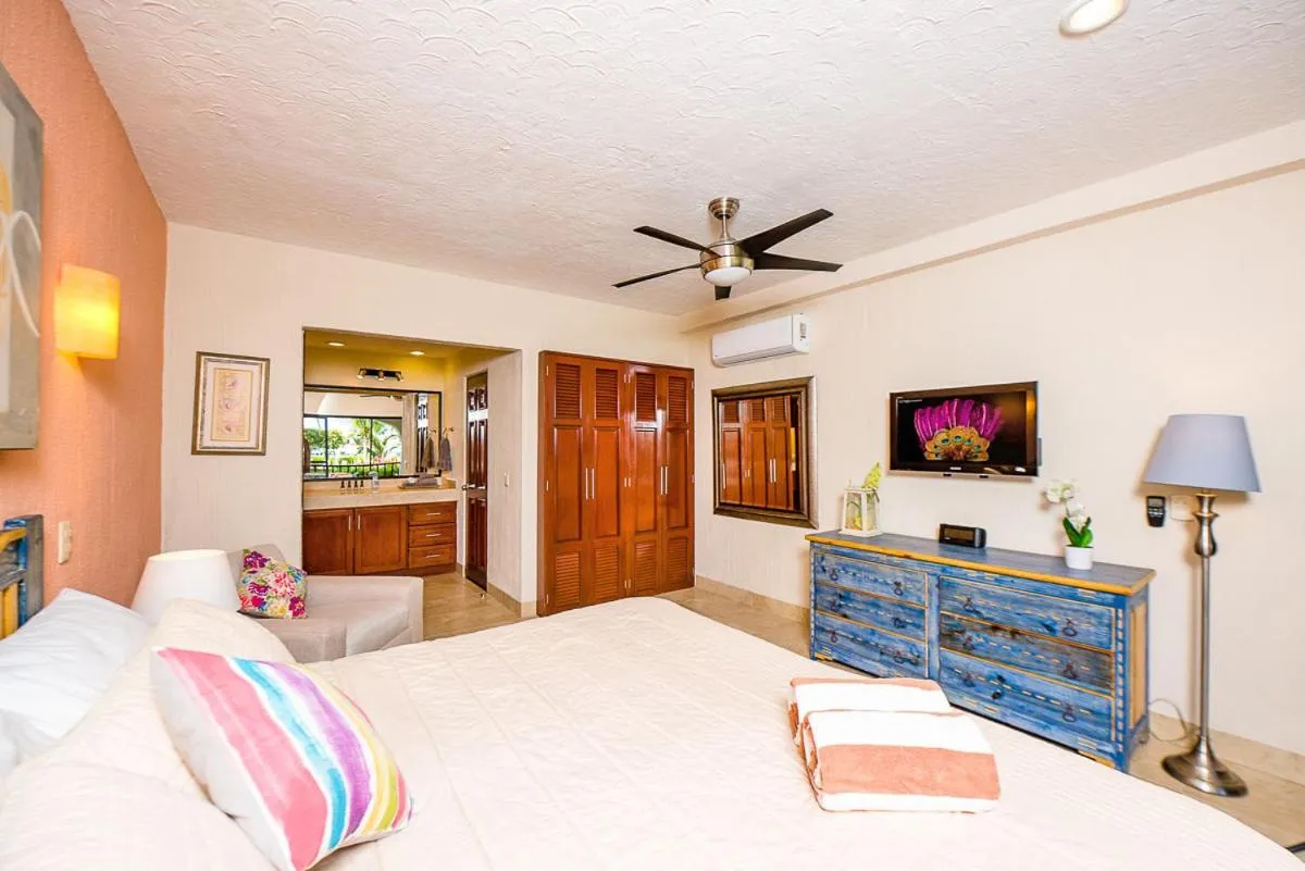 Bed in Xaman Ha Beach Front Condo