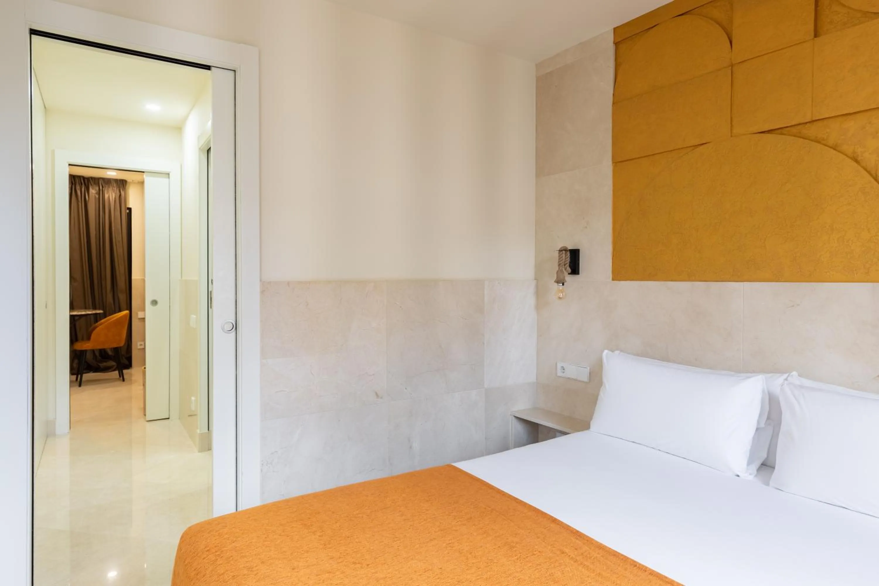 Bed in Cosmo Apartments Rambla Catalunya