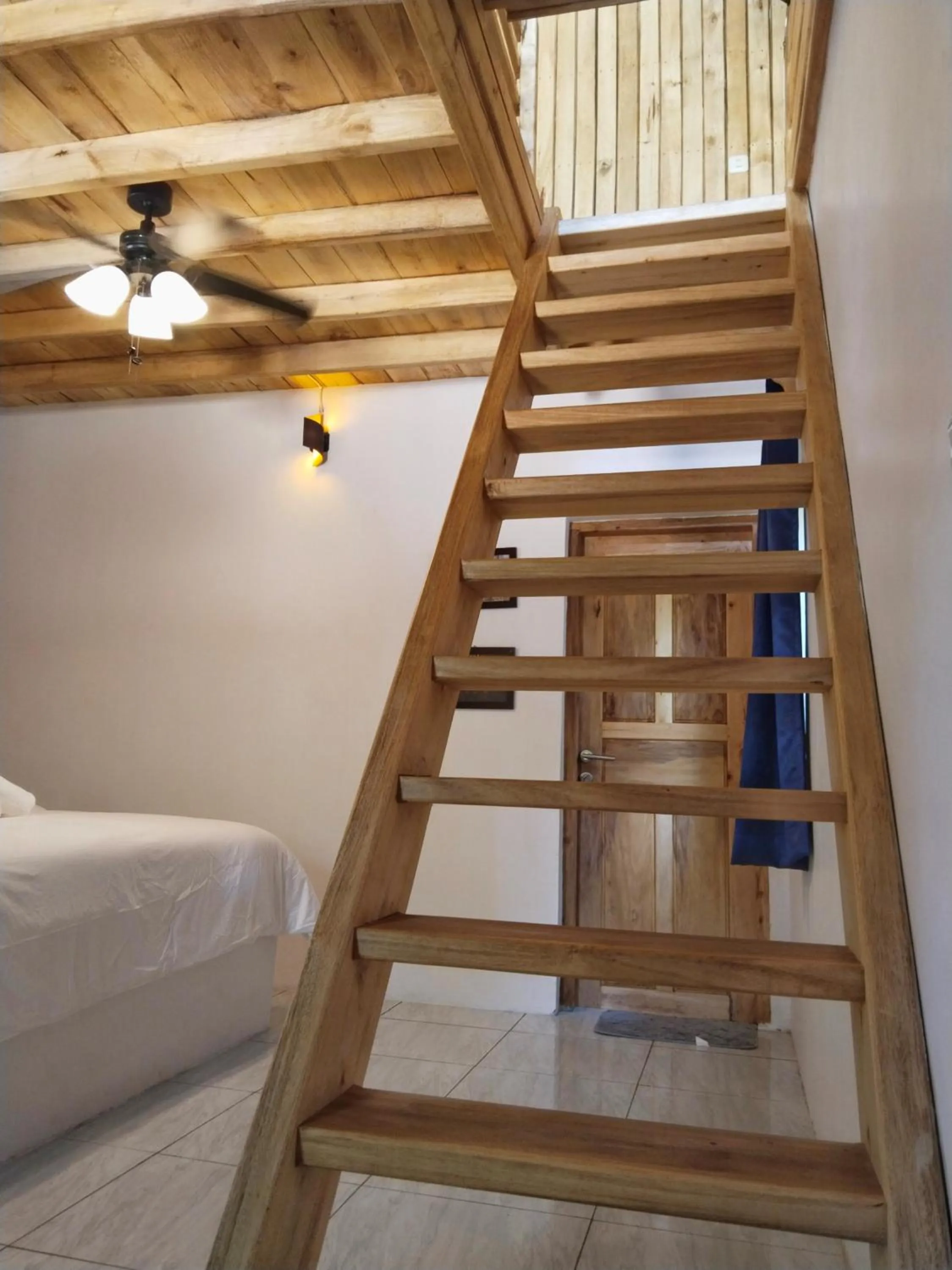 Bed in Blue Planet Dive Resort