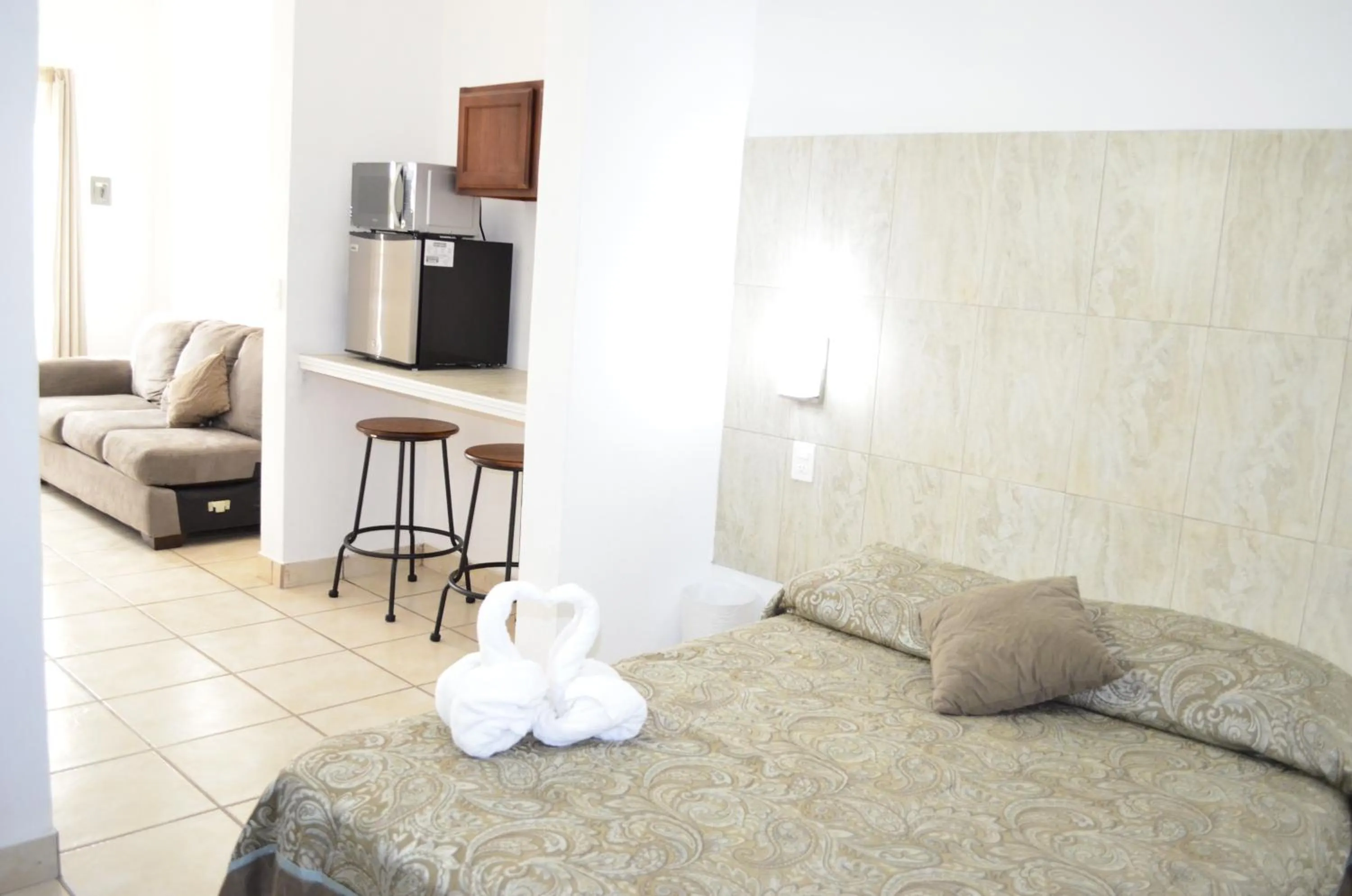 Living room, Bed in Eco Bay Hotel