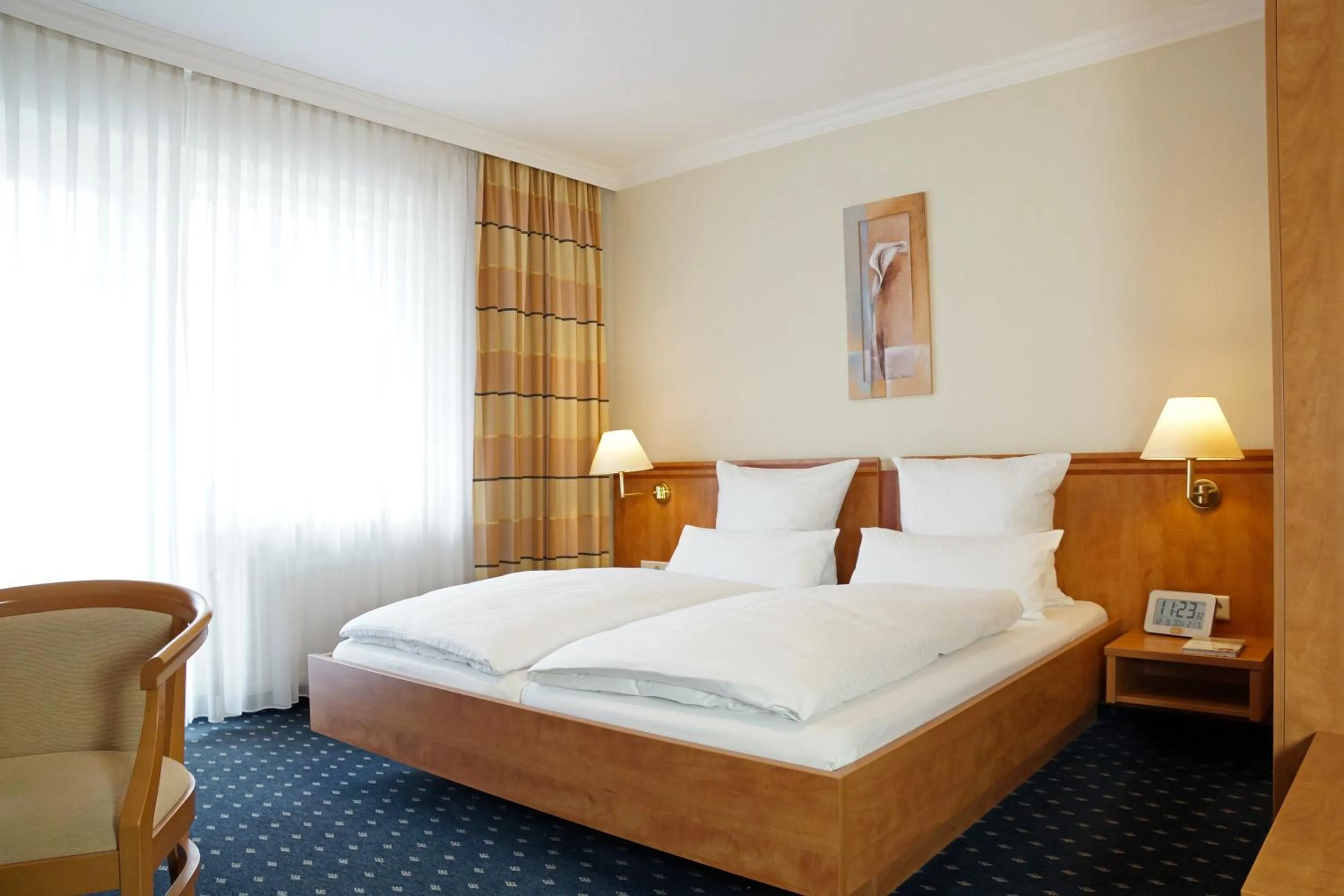 Bed in Hünerbein's Posthotel