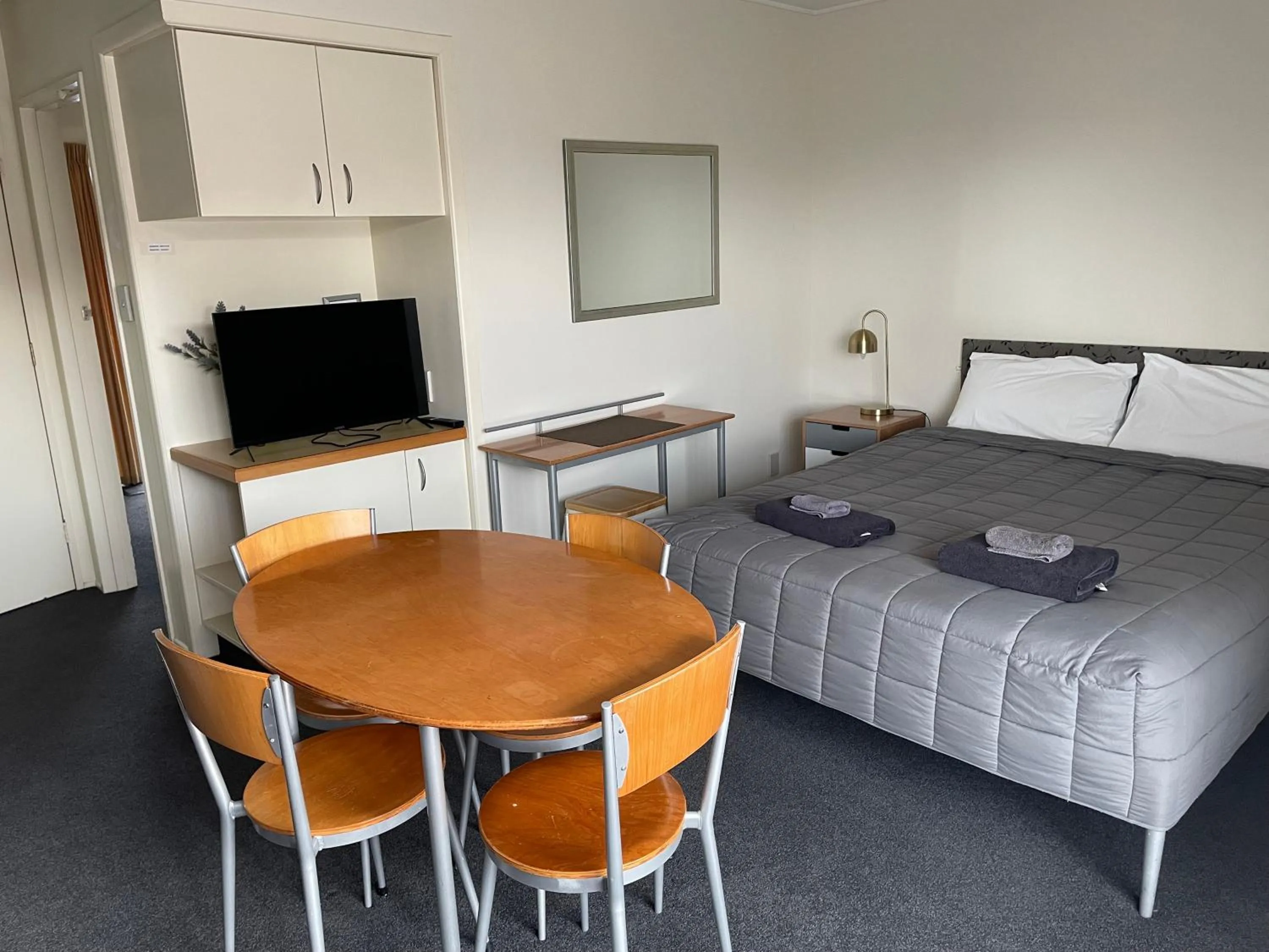 Bed in Bella Tuscany Motor Lodge