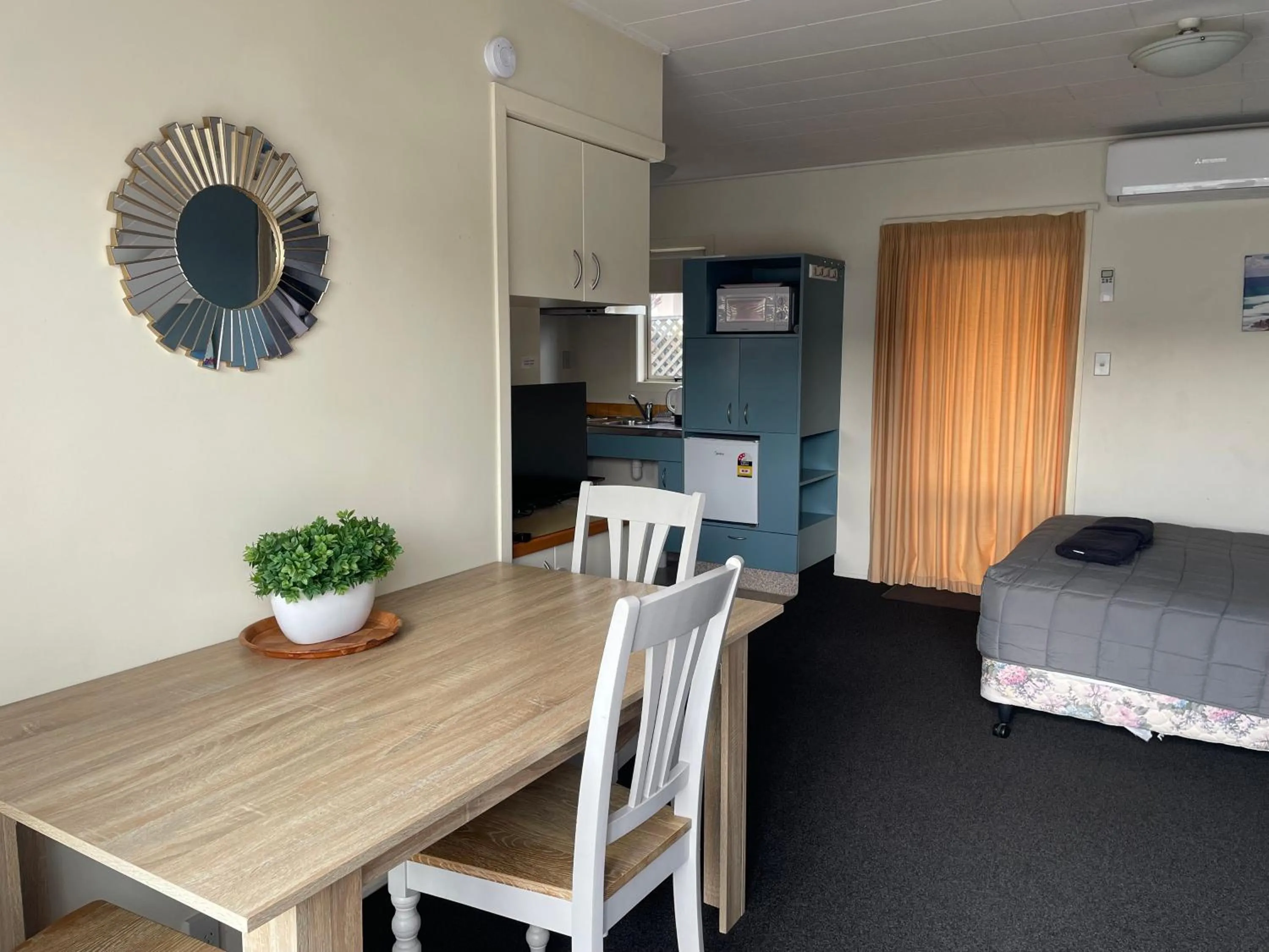 Bed in Bella Tuscany Motor Lodge