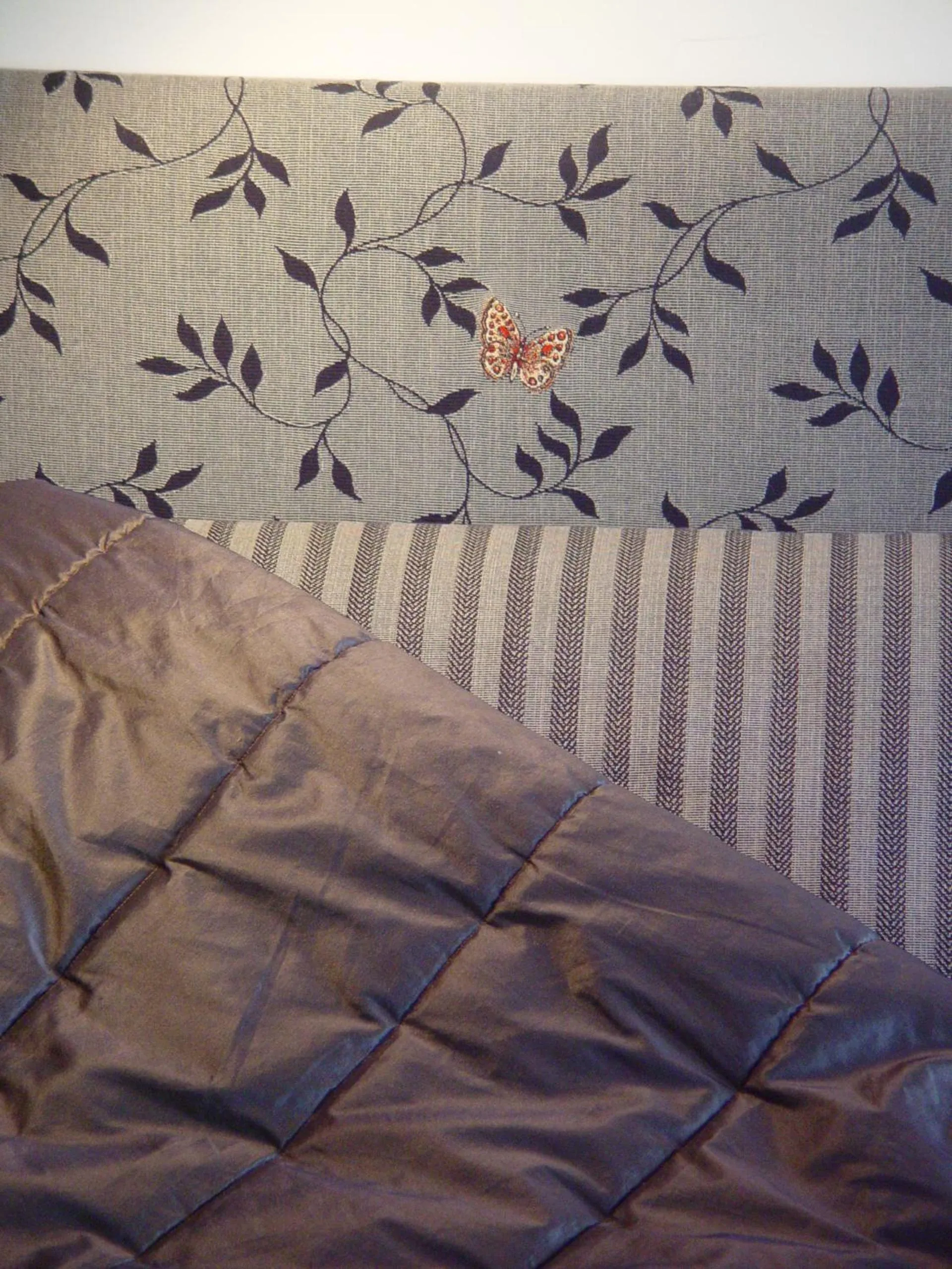 Bed in Bella Tuscany Motor Lodge