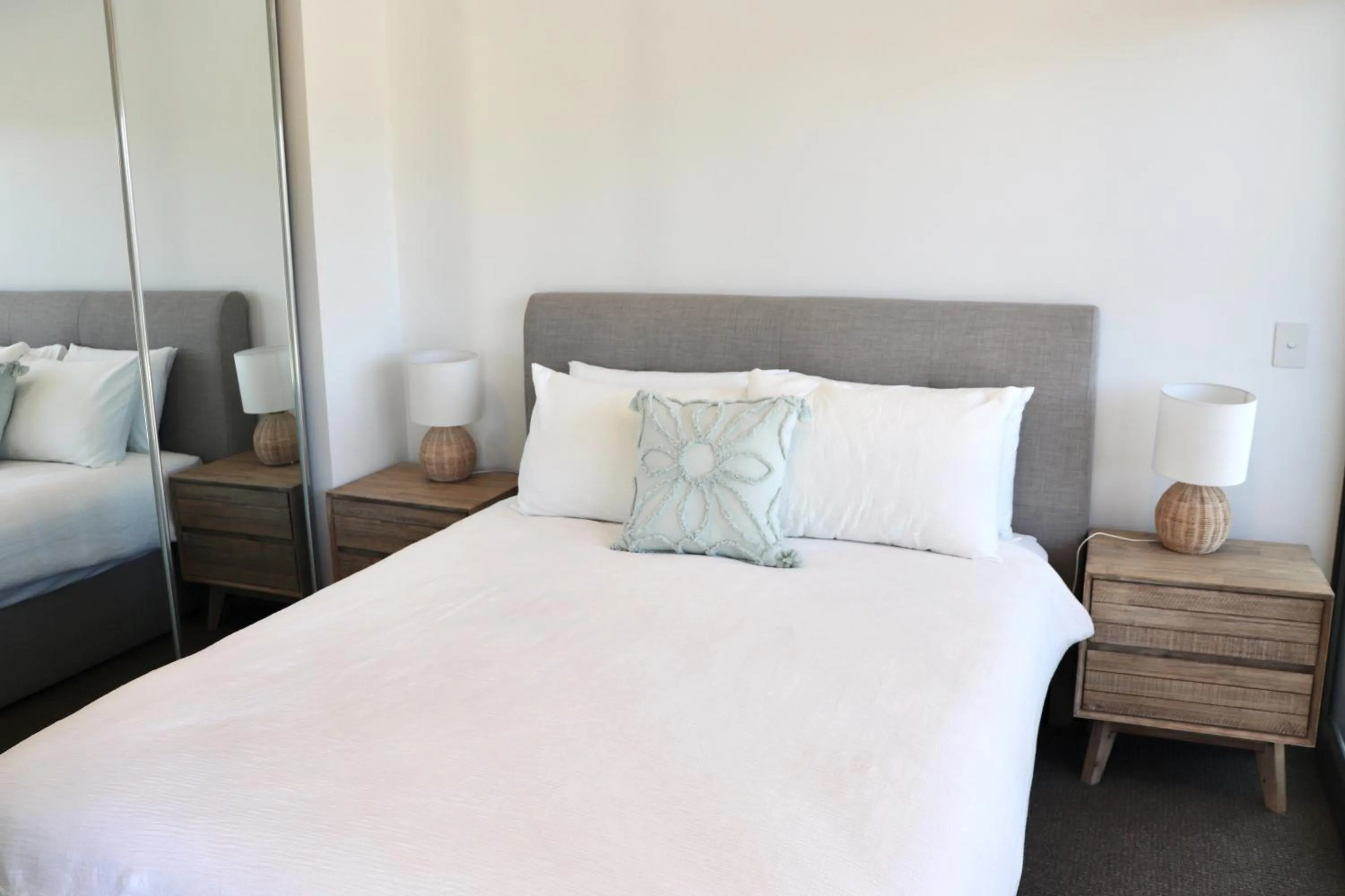 Bed in X Kirra Apartments