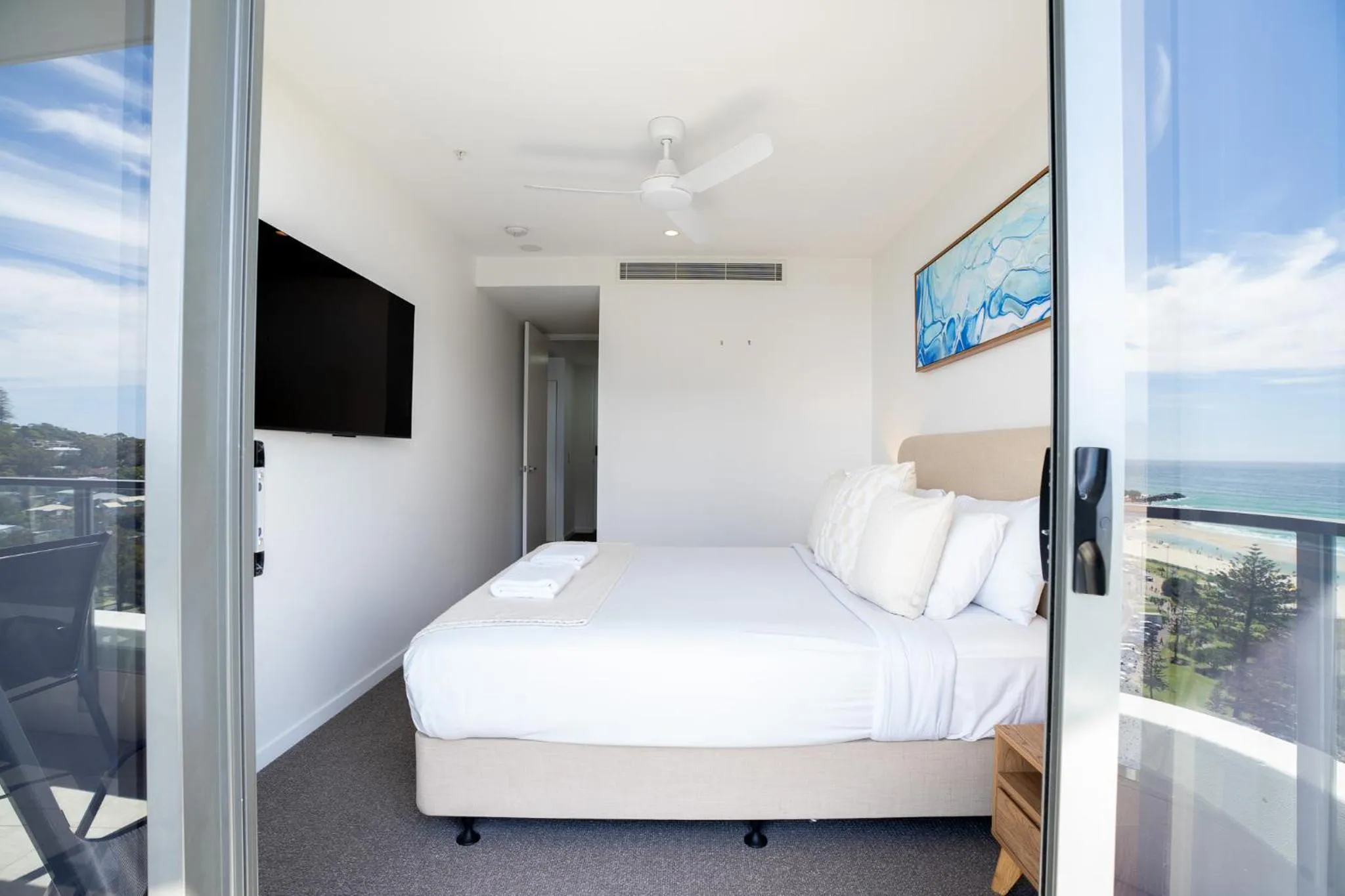 Bed in X Kirra Apartments