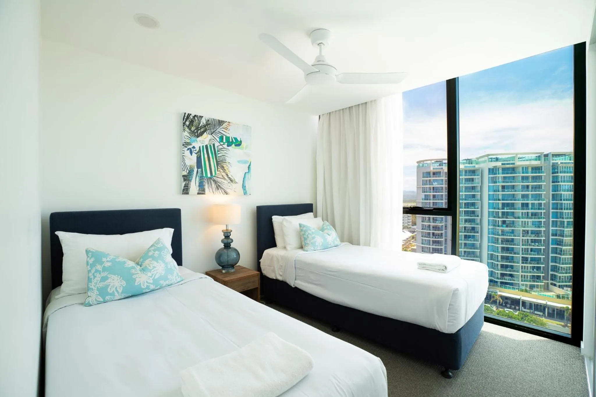 Bed in X Kirra Apartments