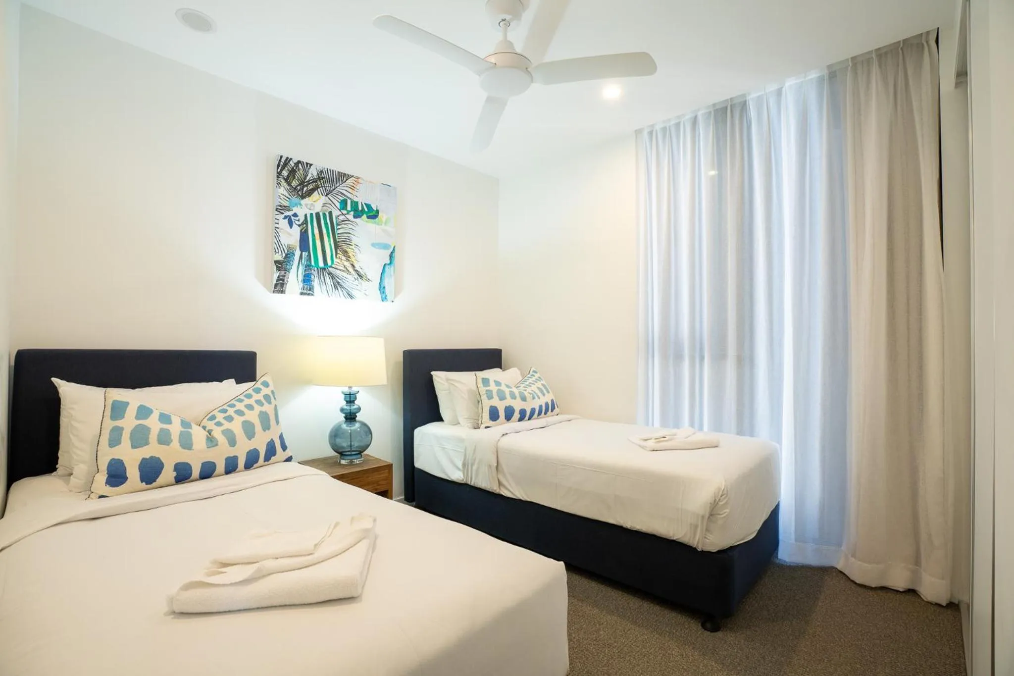 Bed in X Kirra Apartments