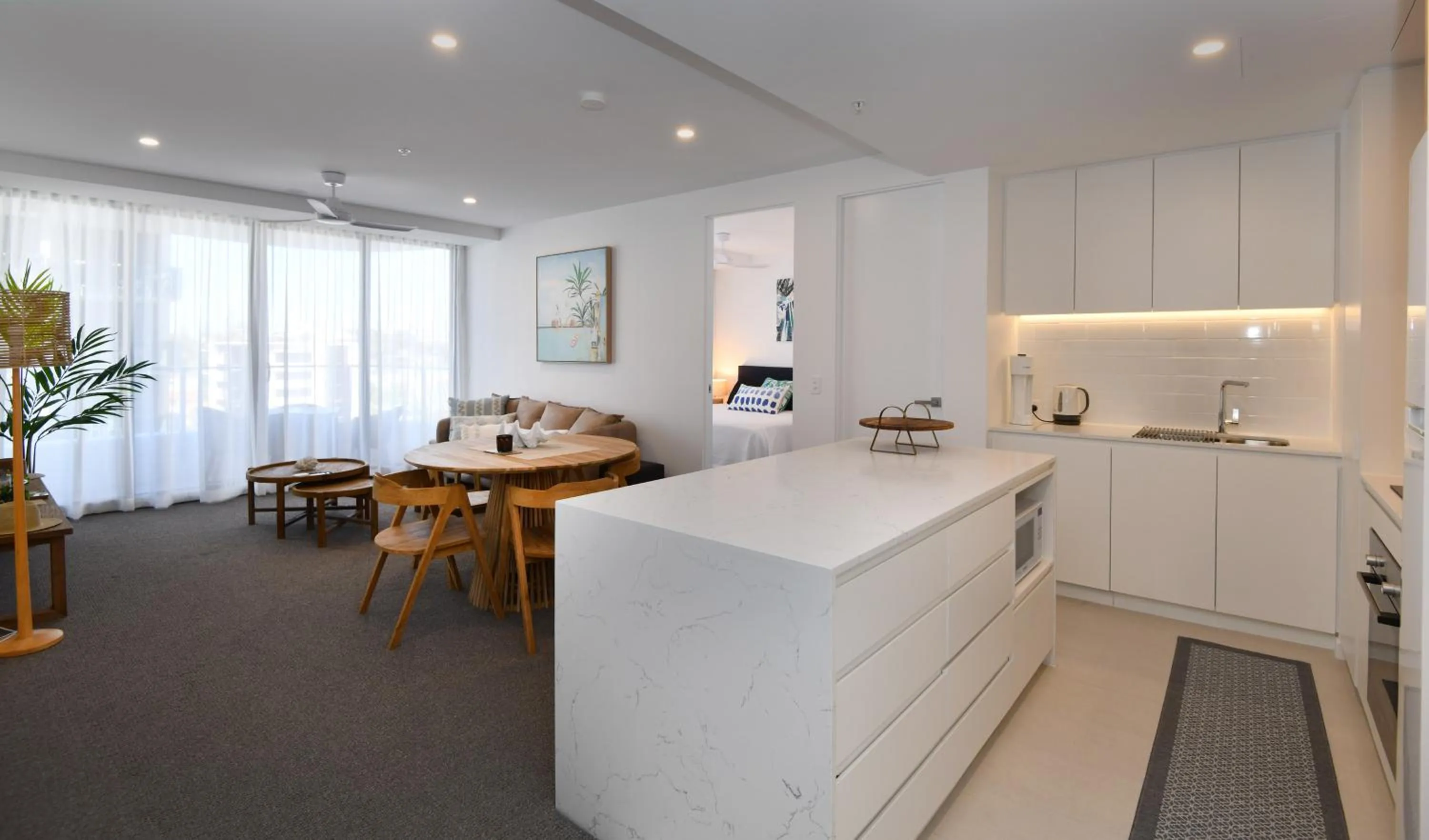 Kitchen or kitchenette in X Kirra Apartments