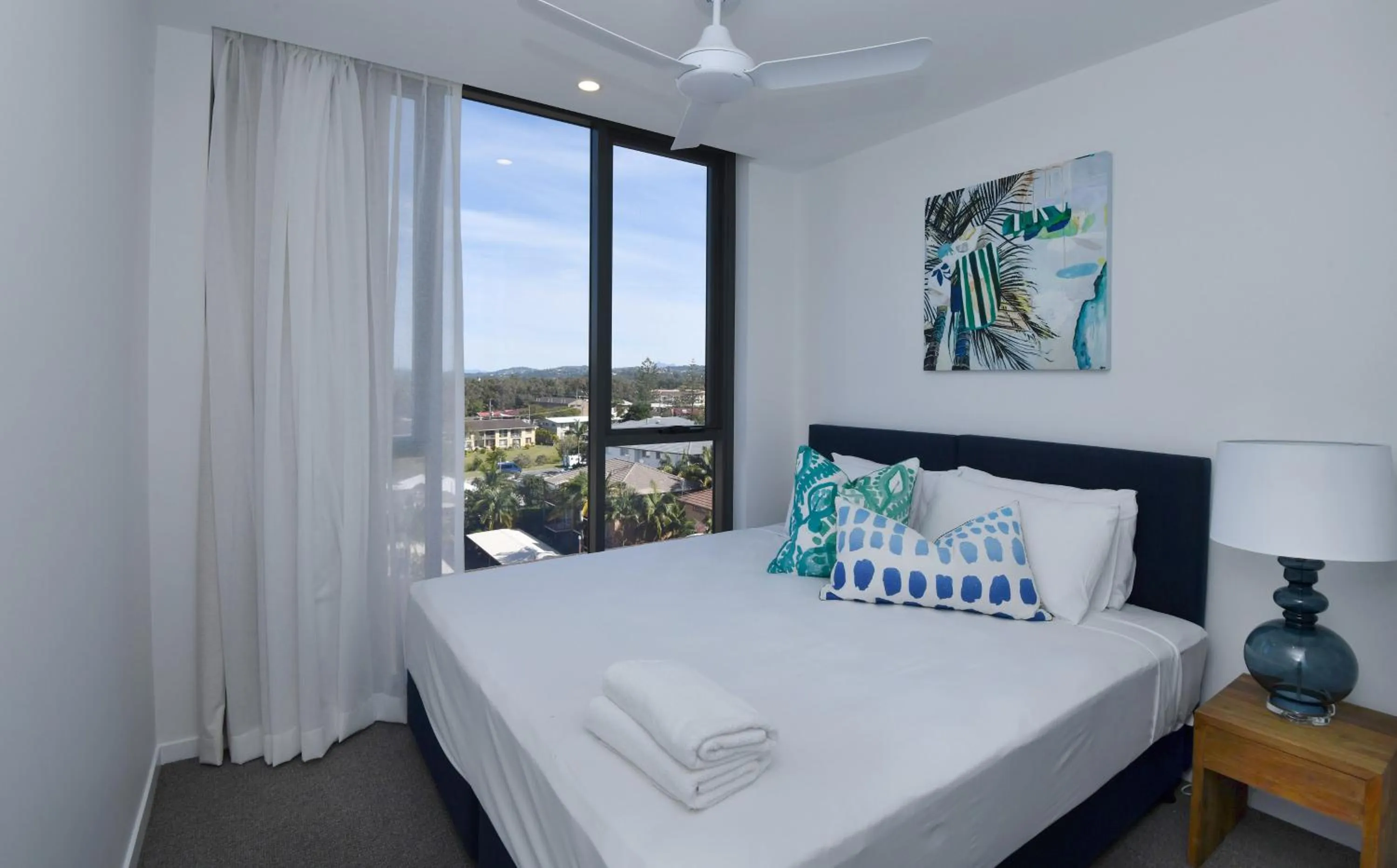 Bed in X Kirra Apartments