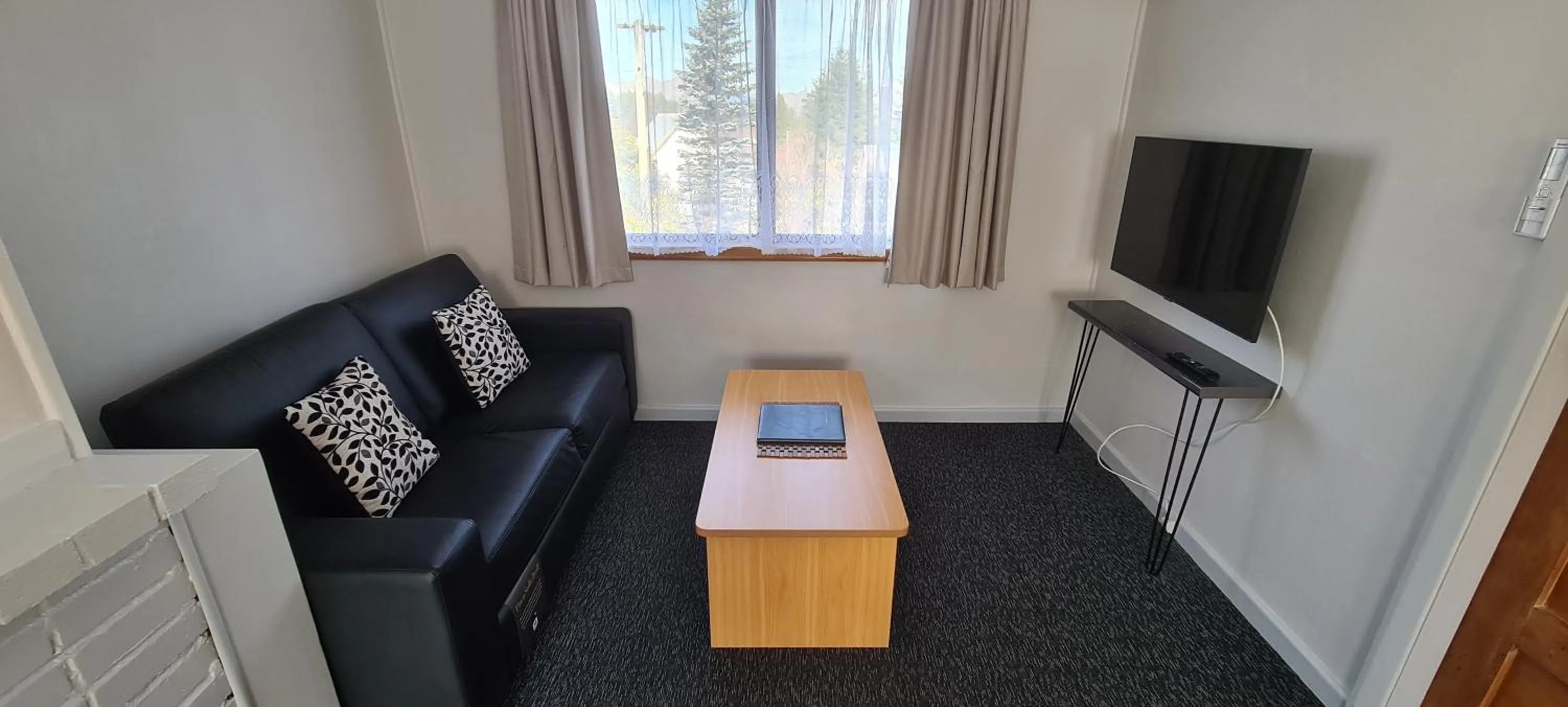 Seating area in Forest Peak Motel