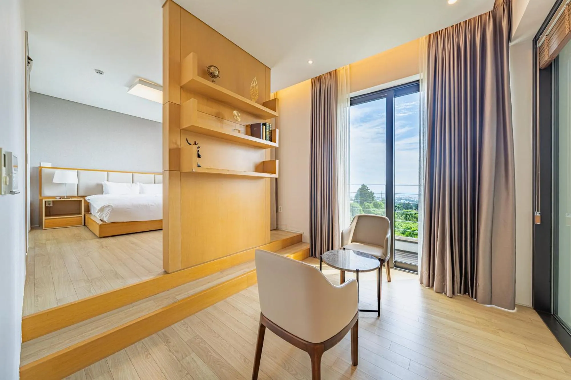 Seating area, Bed in Velum Resort