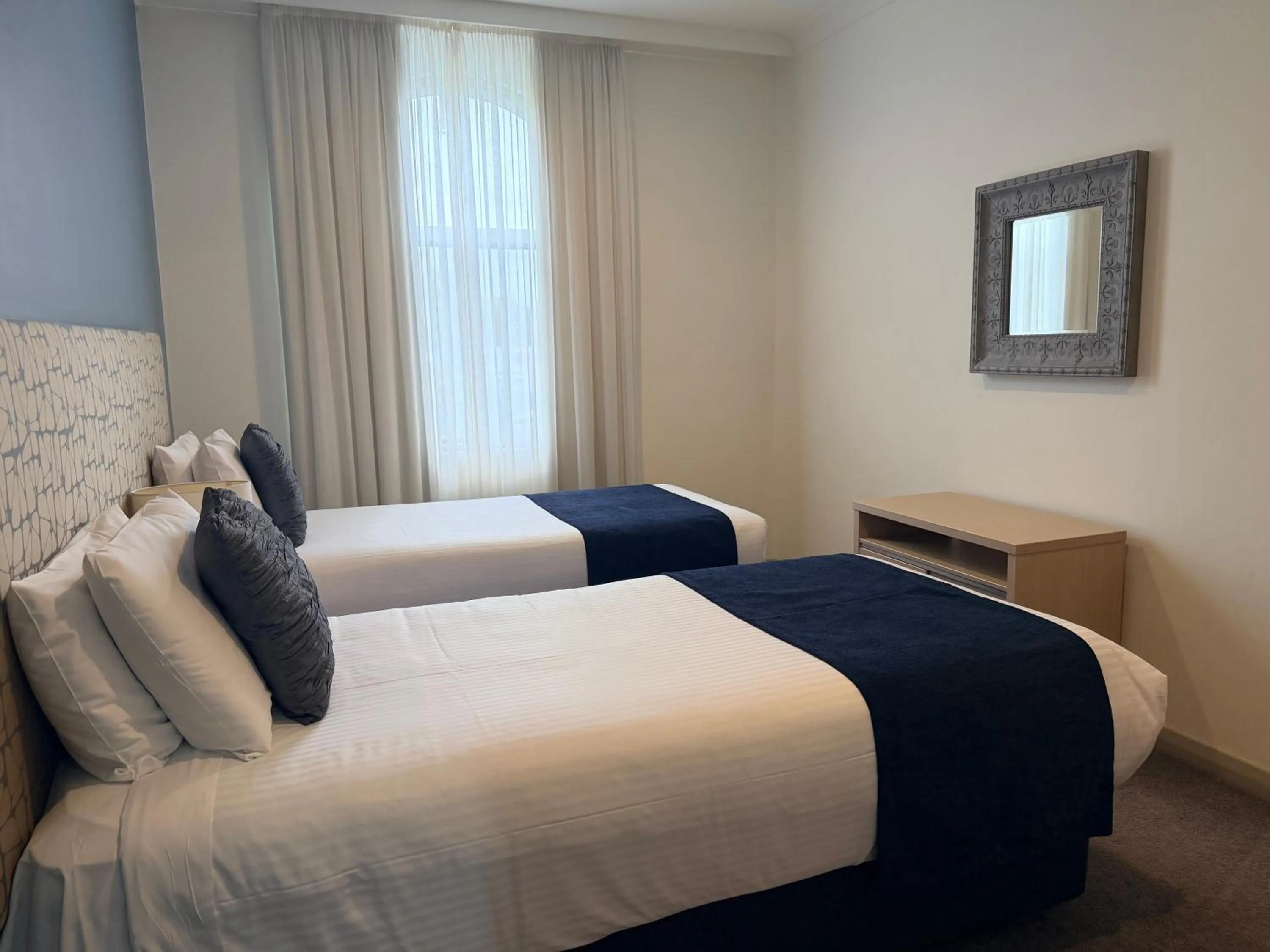 Bed in Korora Bay Village Resort