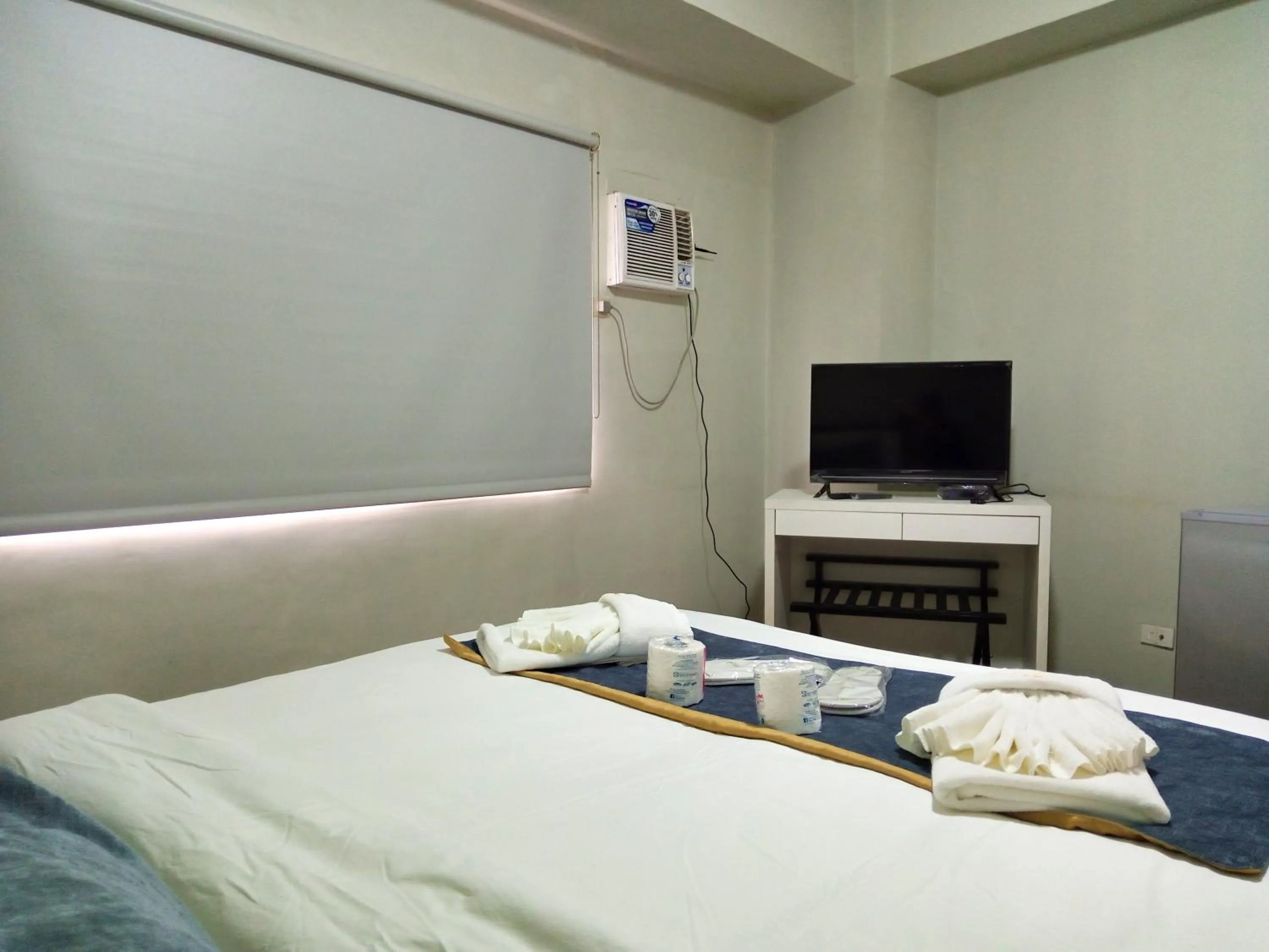 TV/Entertainment Center in White Knight Hotel Saint Anne