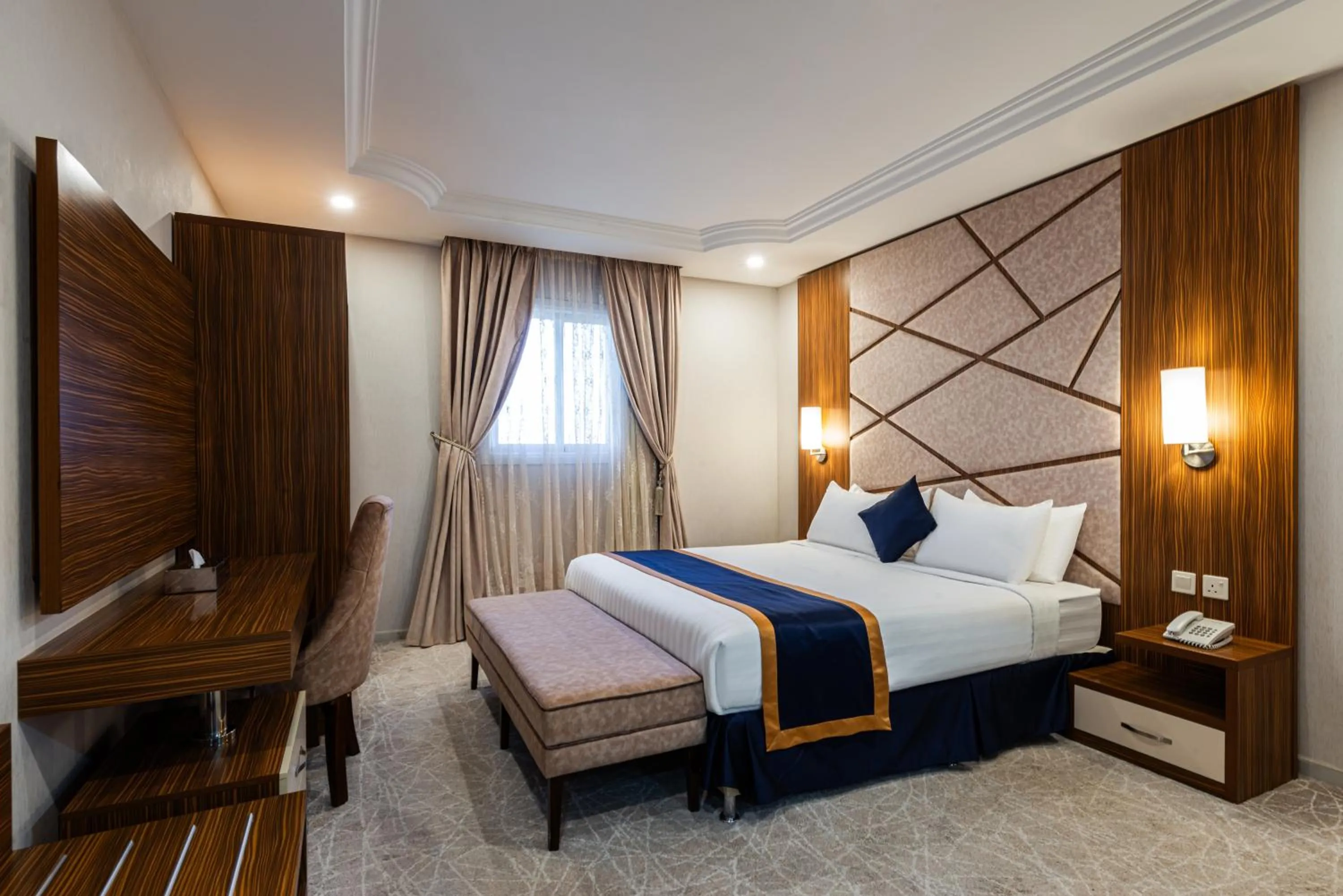 Bed in The Palaces Hotel Suites - Wadeen