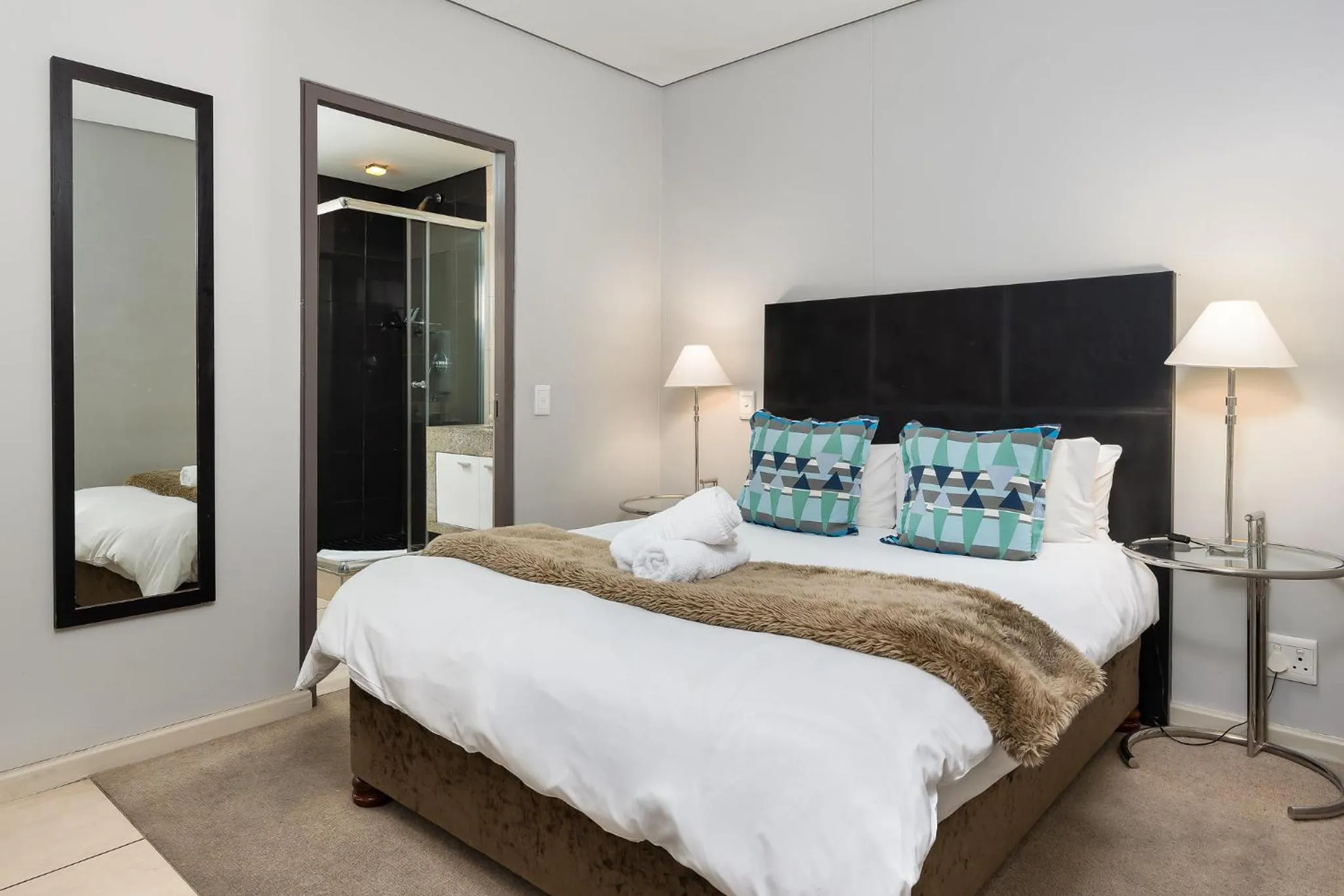 Bed in HarbourEdge Suites by Totalstay