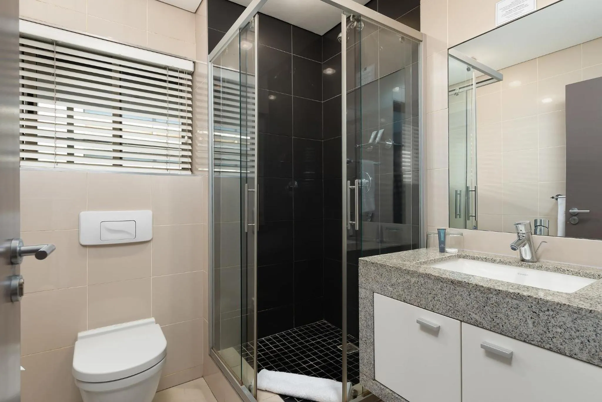 Bathroom in HarbourEdge Suites by Totalstay