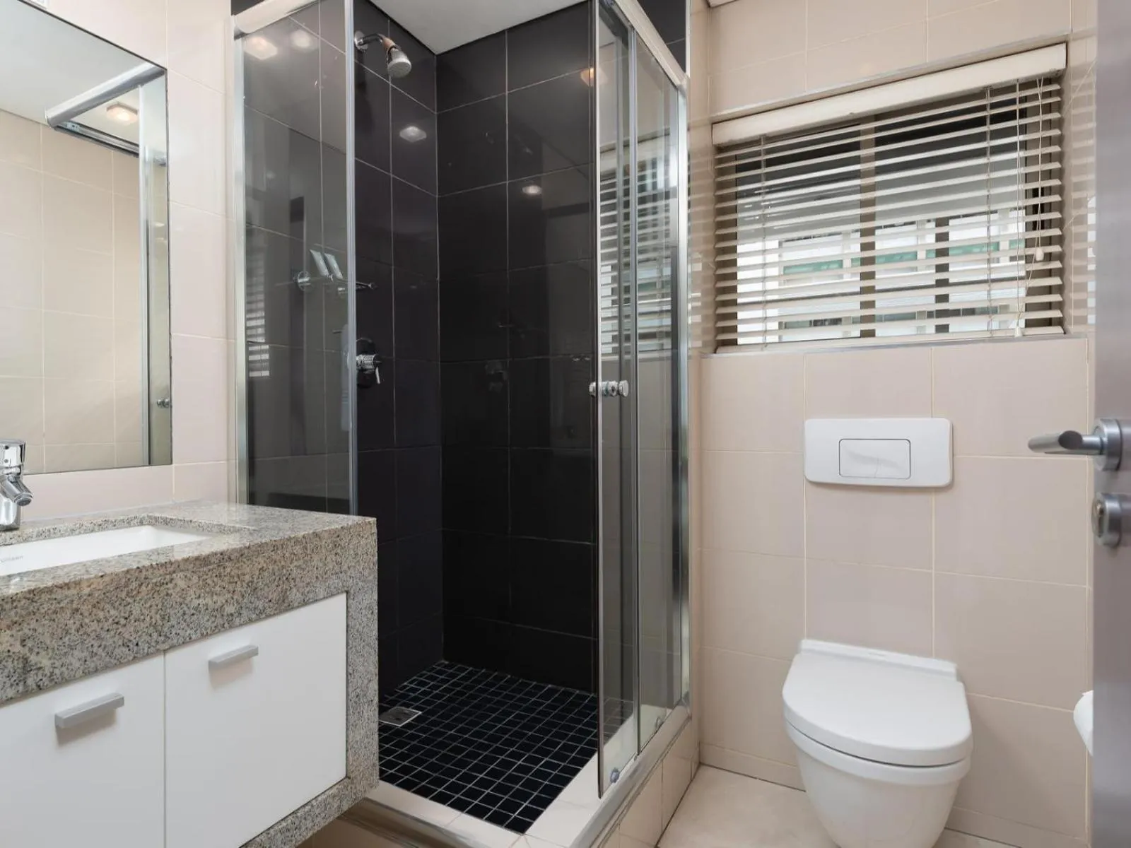 Bathroom in HarbourEdge Suites by Totalstay