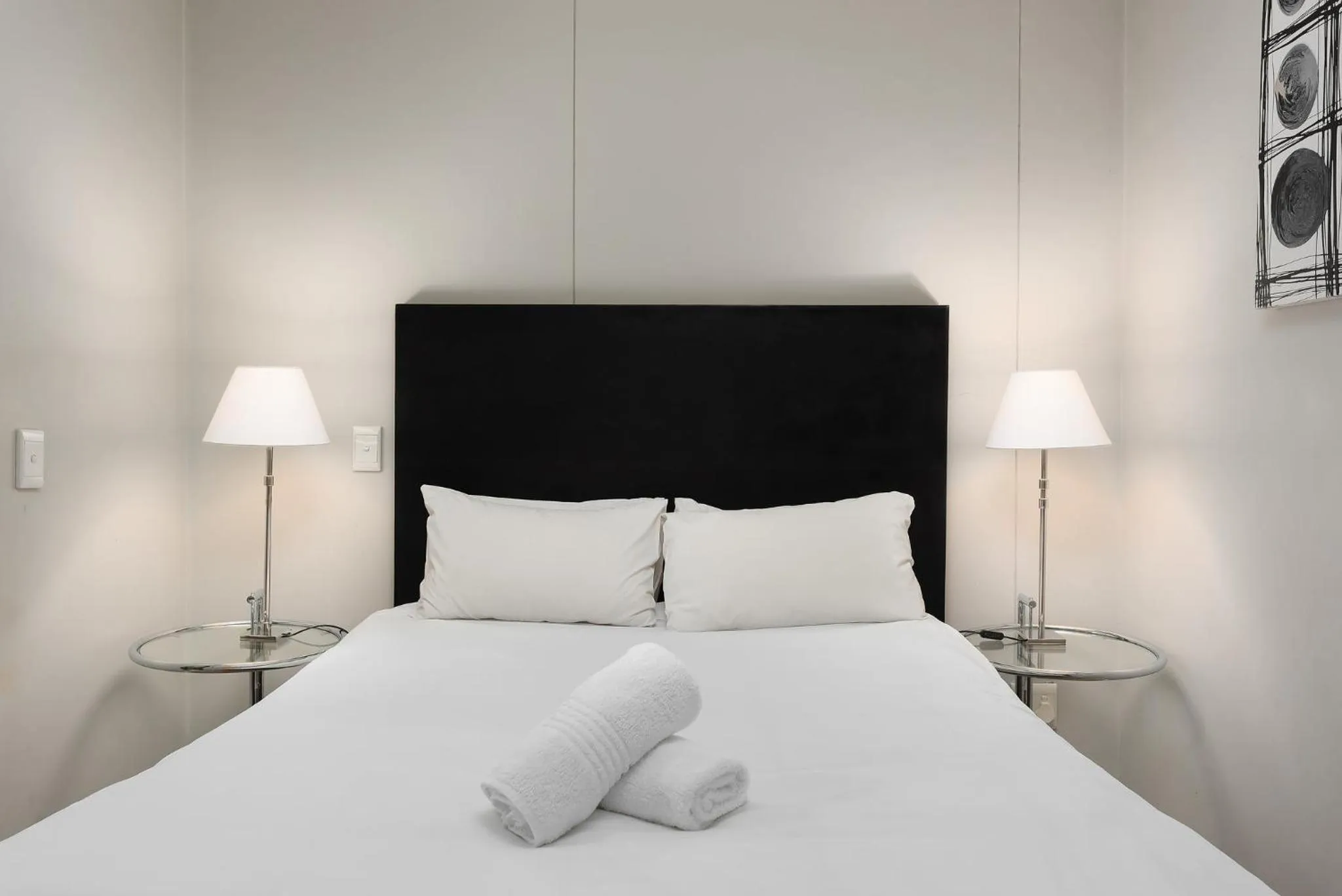 Bed in HarbourEdge Suites by Totalstay