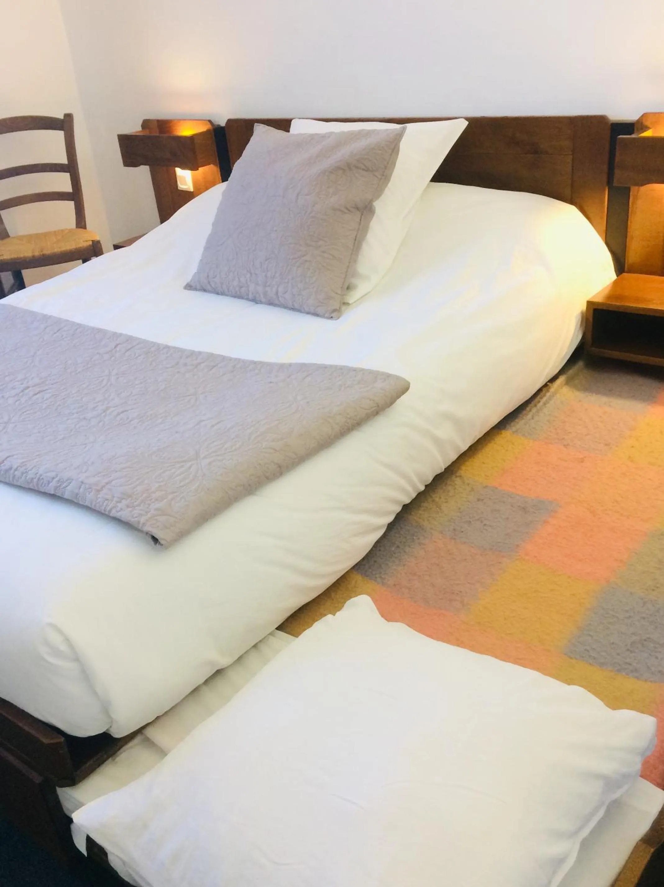 Bed in Logis Hôtel LE DAHU