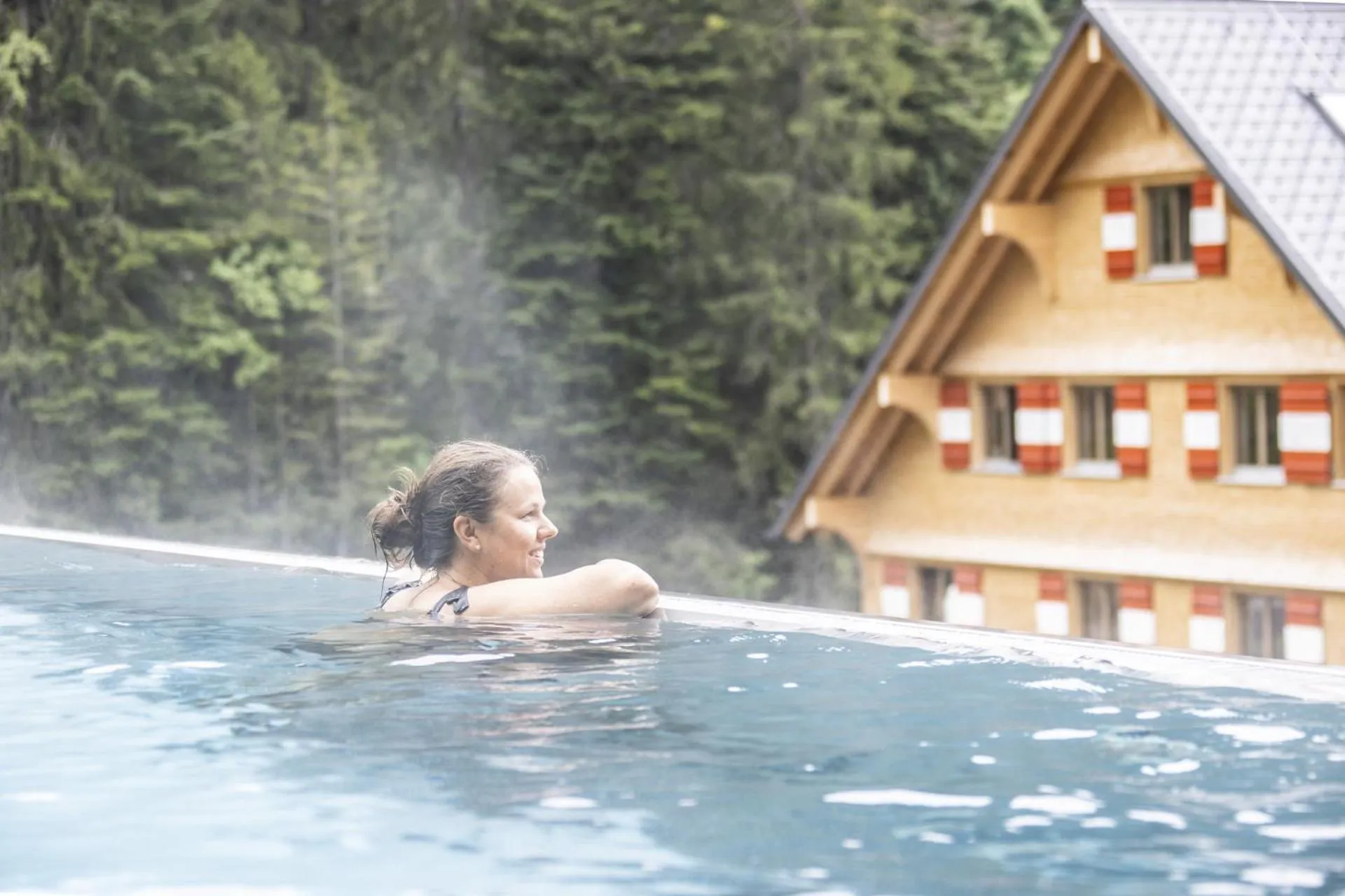 Swimming pool in Berghaus Schröcken - Hotel Apartments Spa