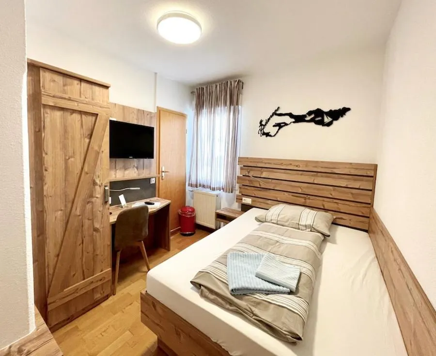 Bed in Gasthof Rebstock