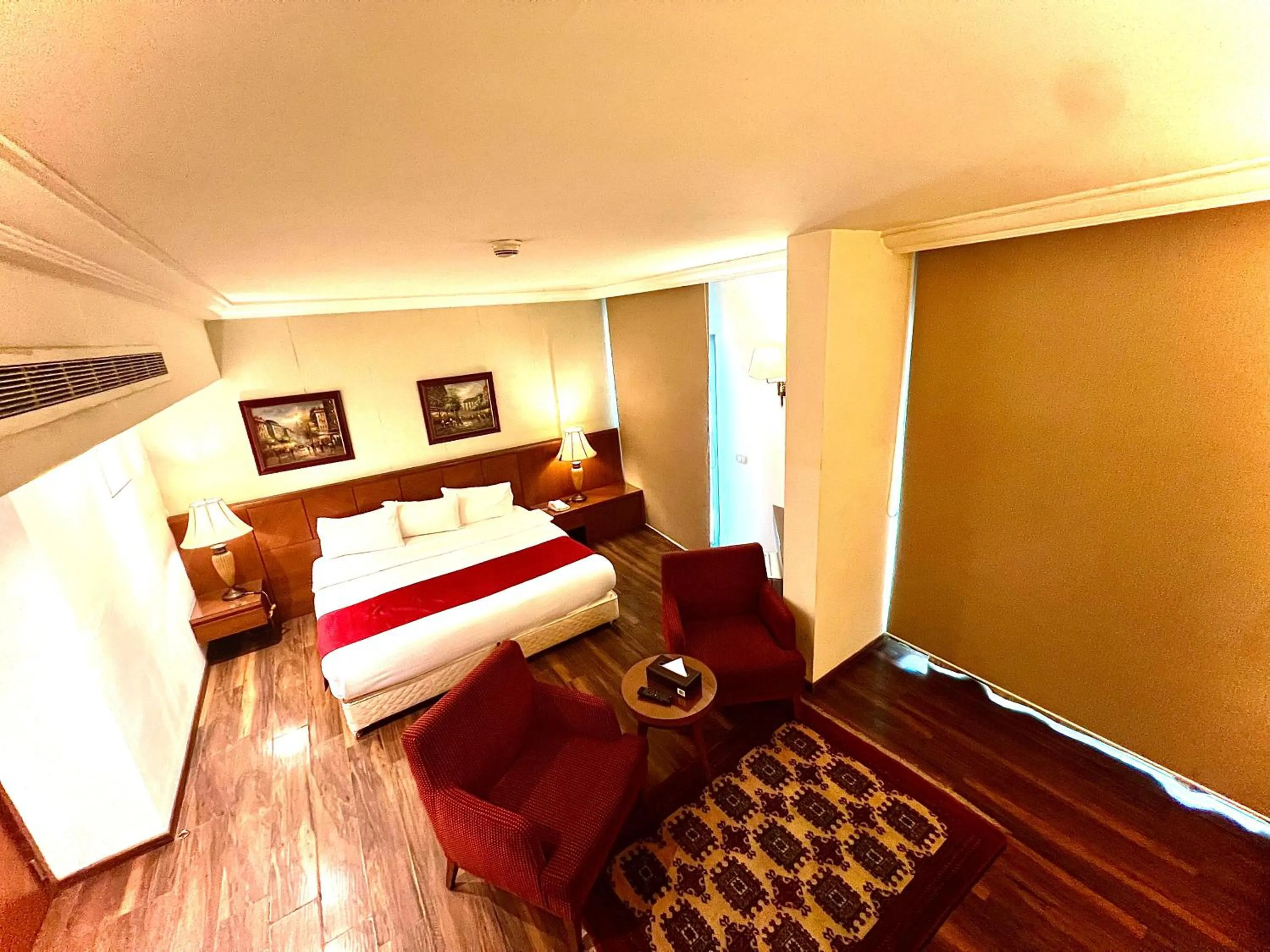 Bedroom, Bed in King Suites Hotel