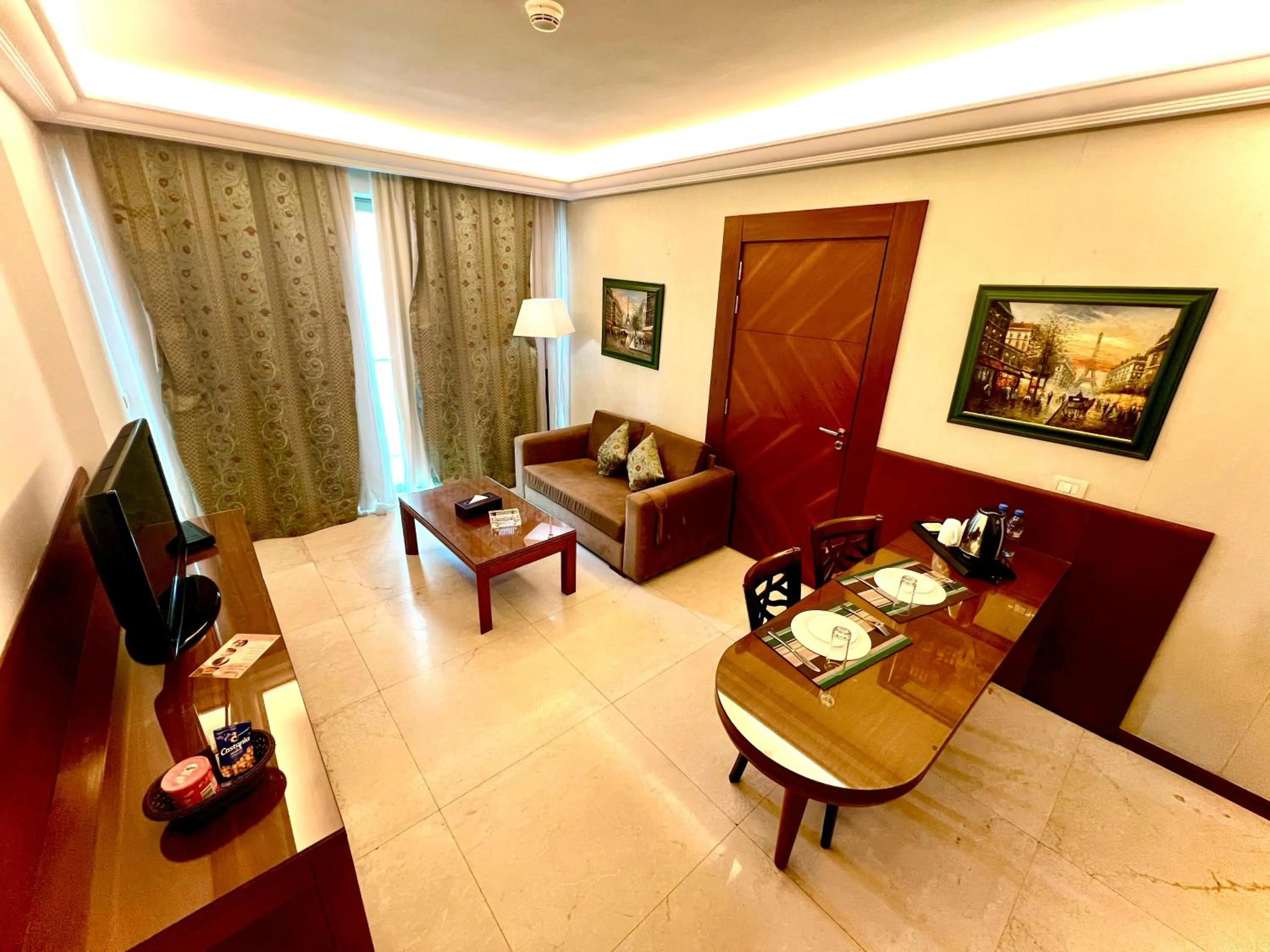 Living room in King Suites Hotel
