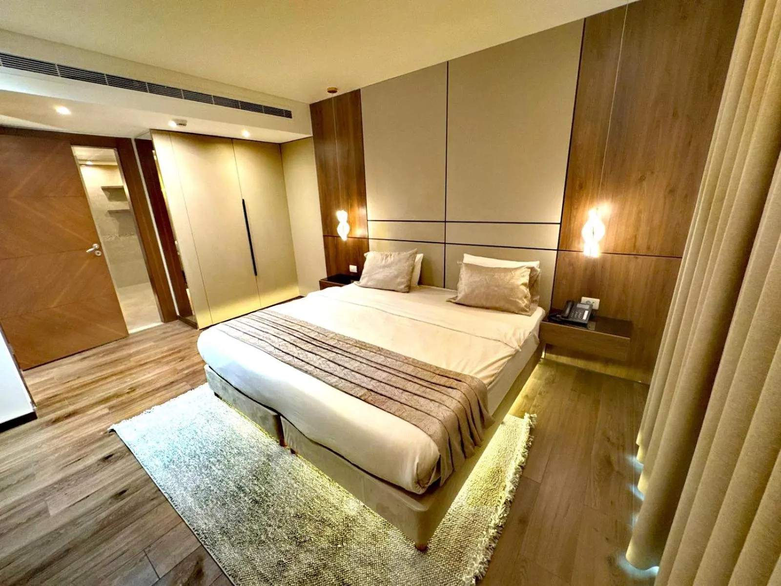 Bed in King Suites Hotel