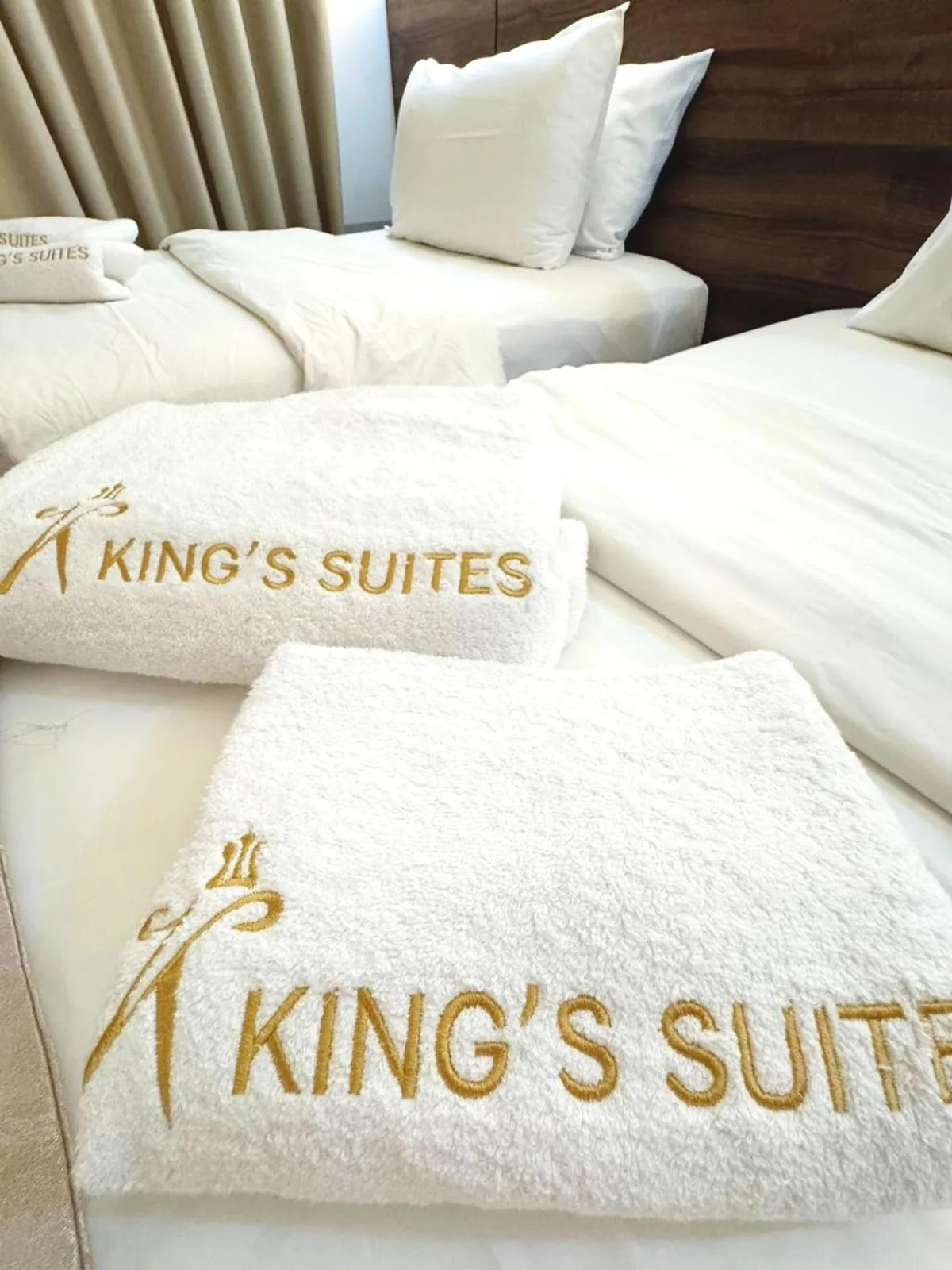 towels, Bed in King Suites Hotel