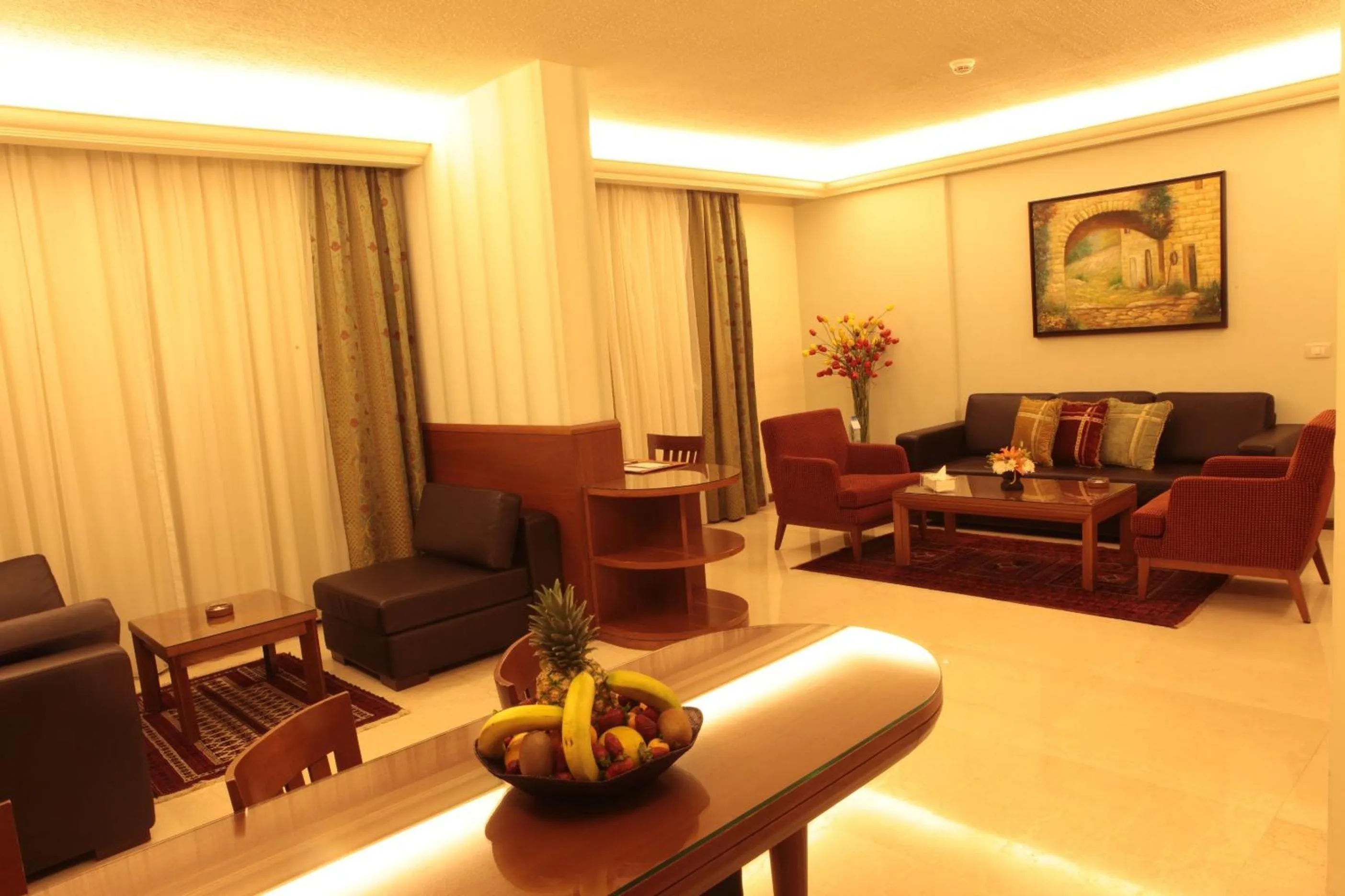 Seating area in King Suites Hotel