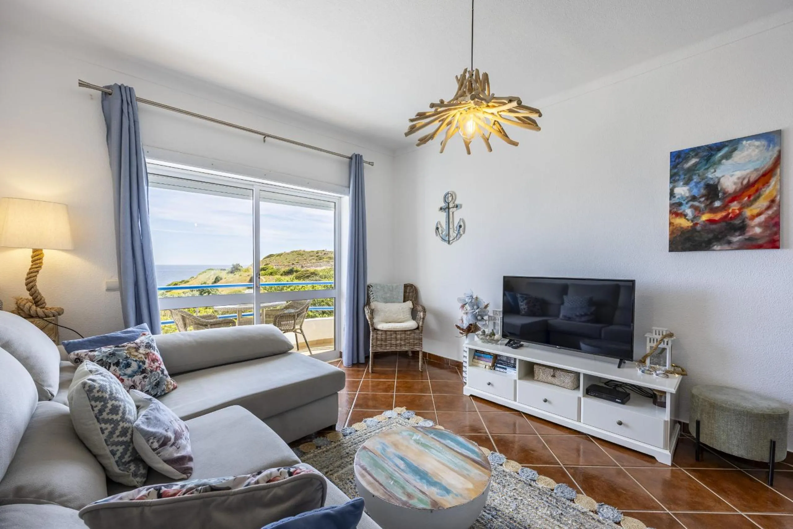 Communal lounge/ TV room in CoolHouses Algarve Luz, 2 Bed top floor flat, amazing sea view, central. Delicia do Sol