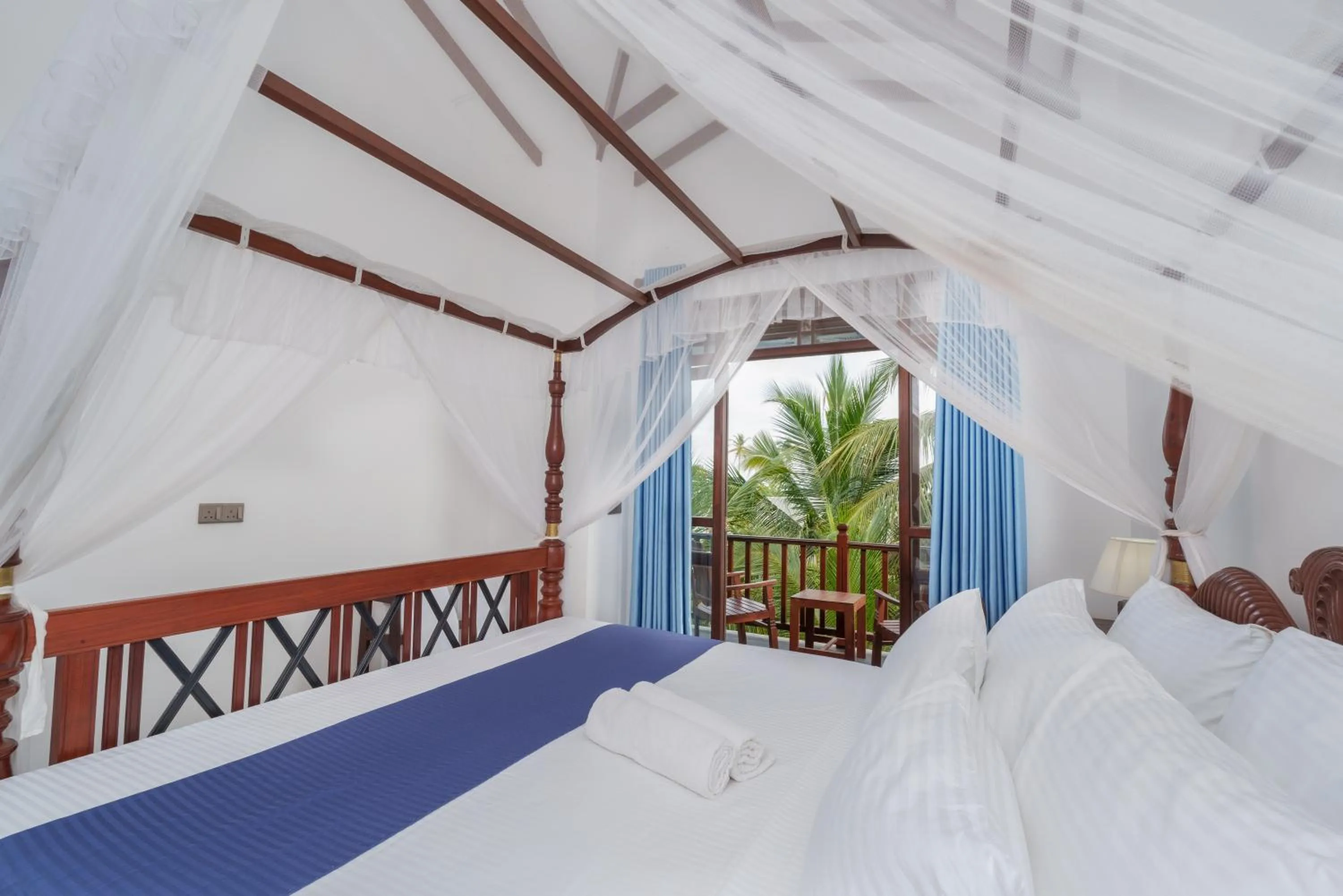 Bed in Olu Ayurveda Beach Resort