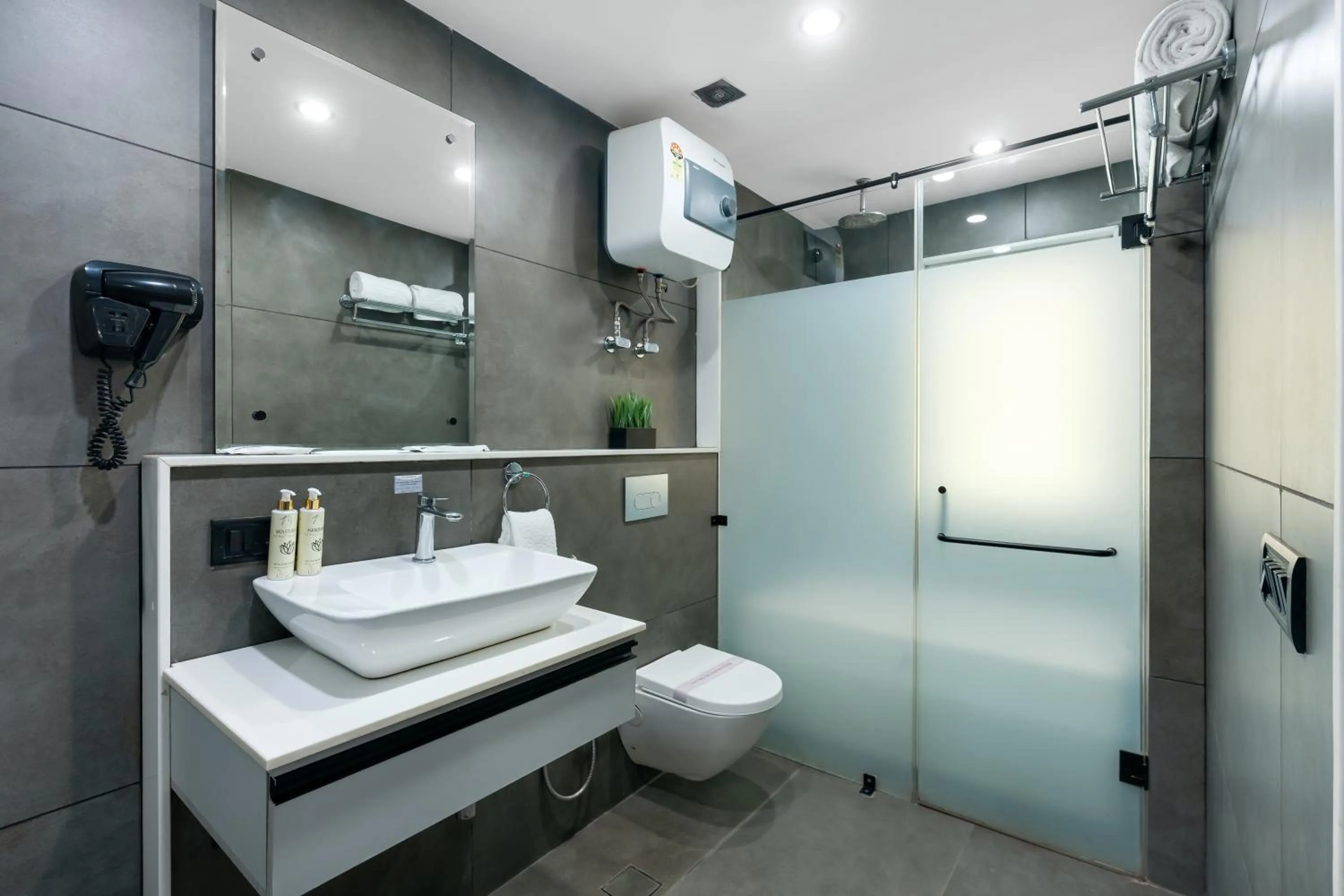 Shower in BedChambers Serviced Apartments, MG ROAD