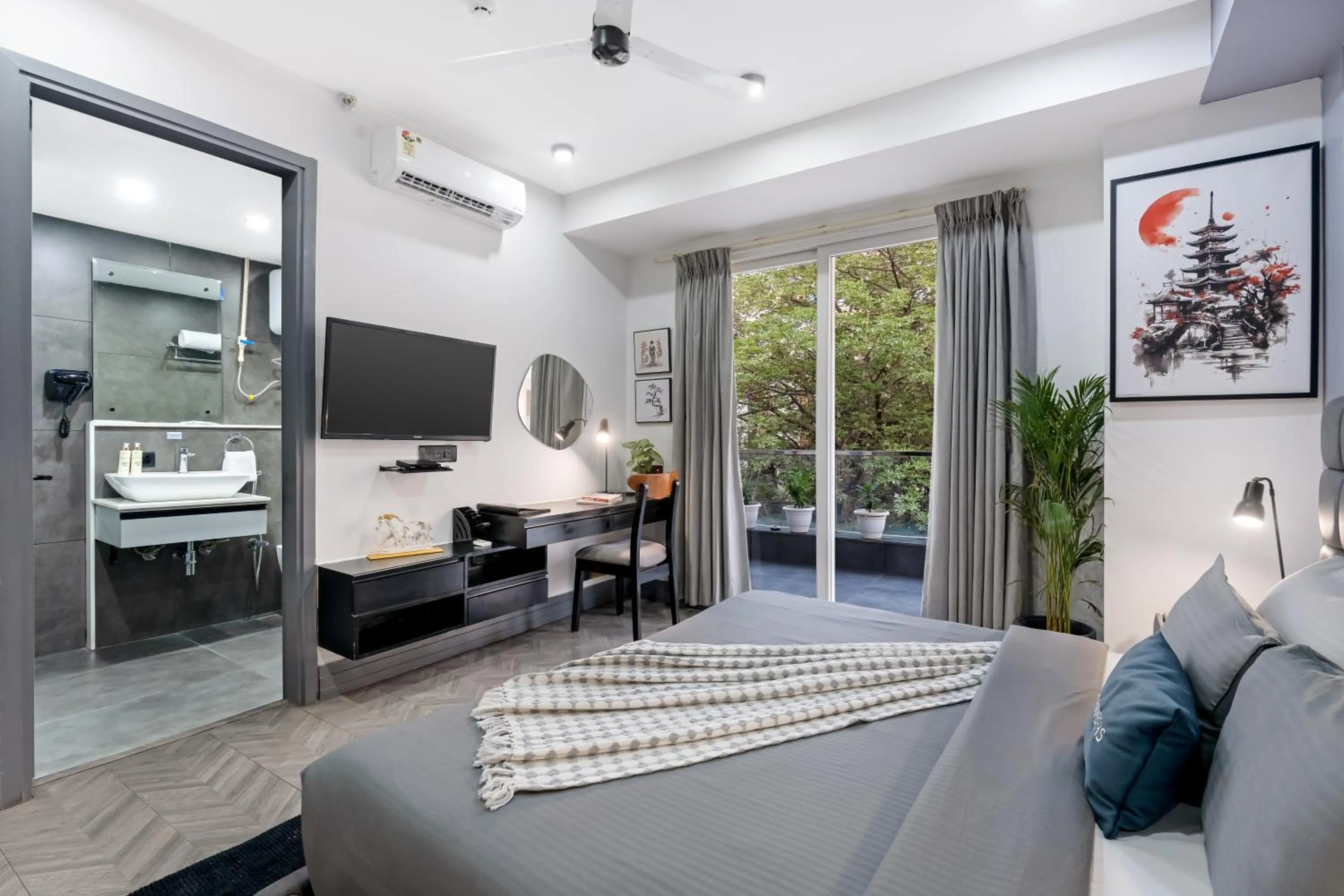 TV and multimedia in BedChambers Serviced Apartments, MG ROAD