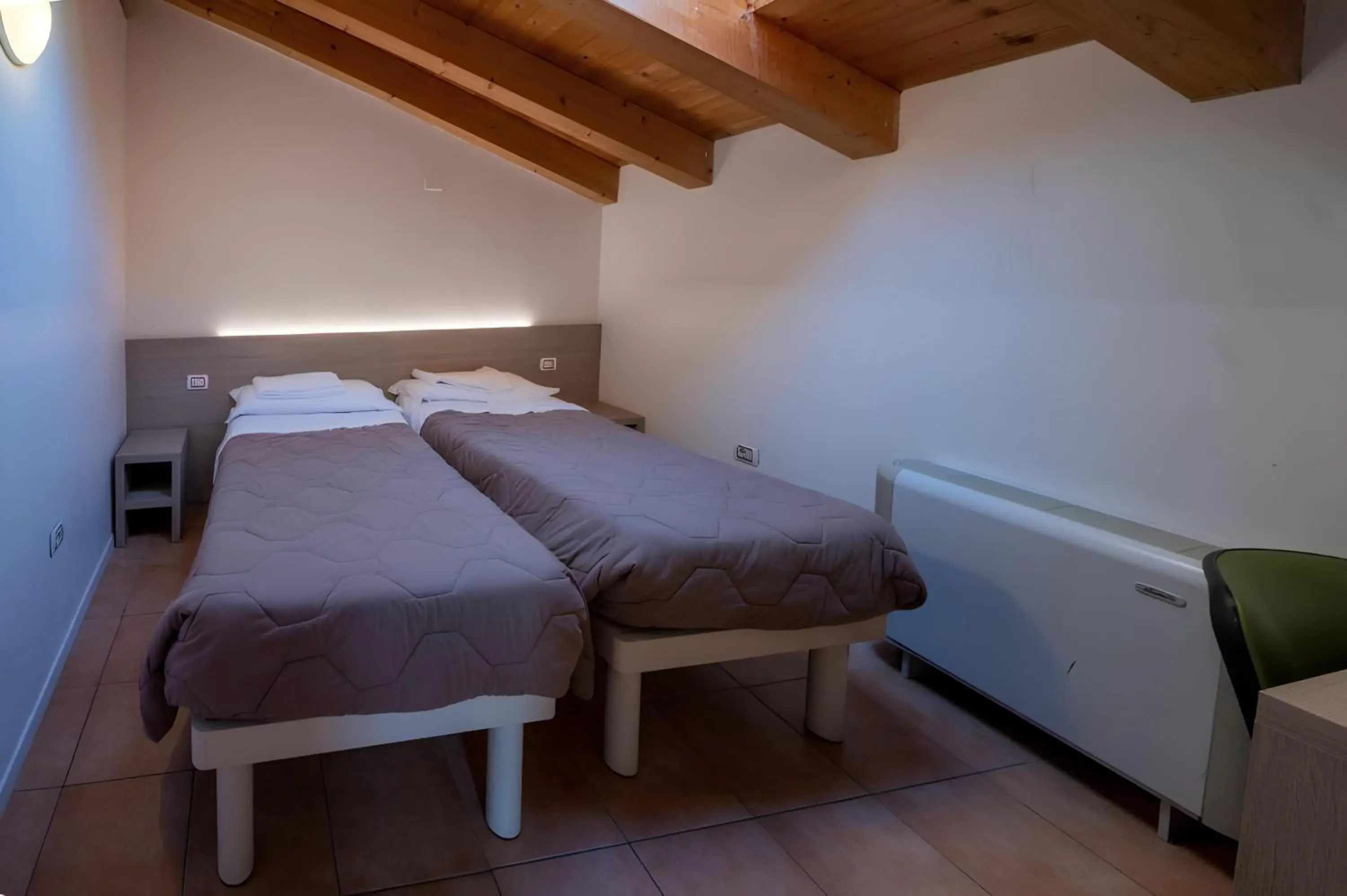 Superior Triple Room in Ostello Città di Rovereto Superior Triple Room in Ostello Città di Rovereto