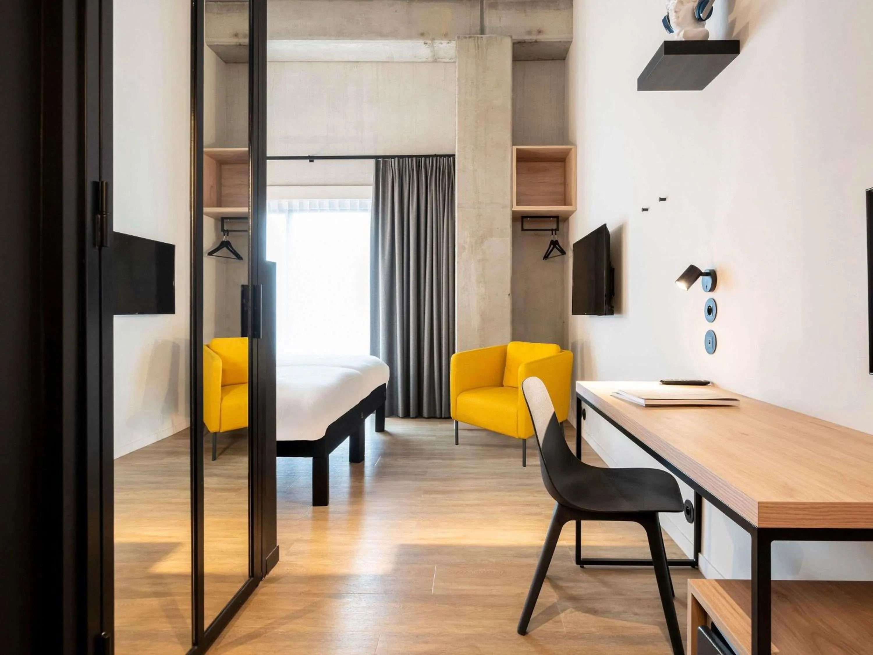 Bedroom in ibis Styles Namur