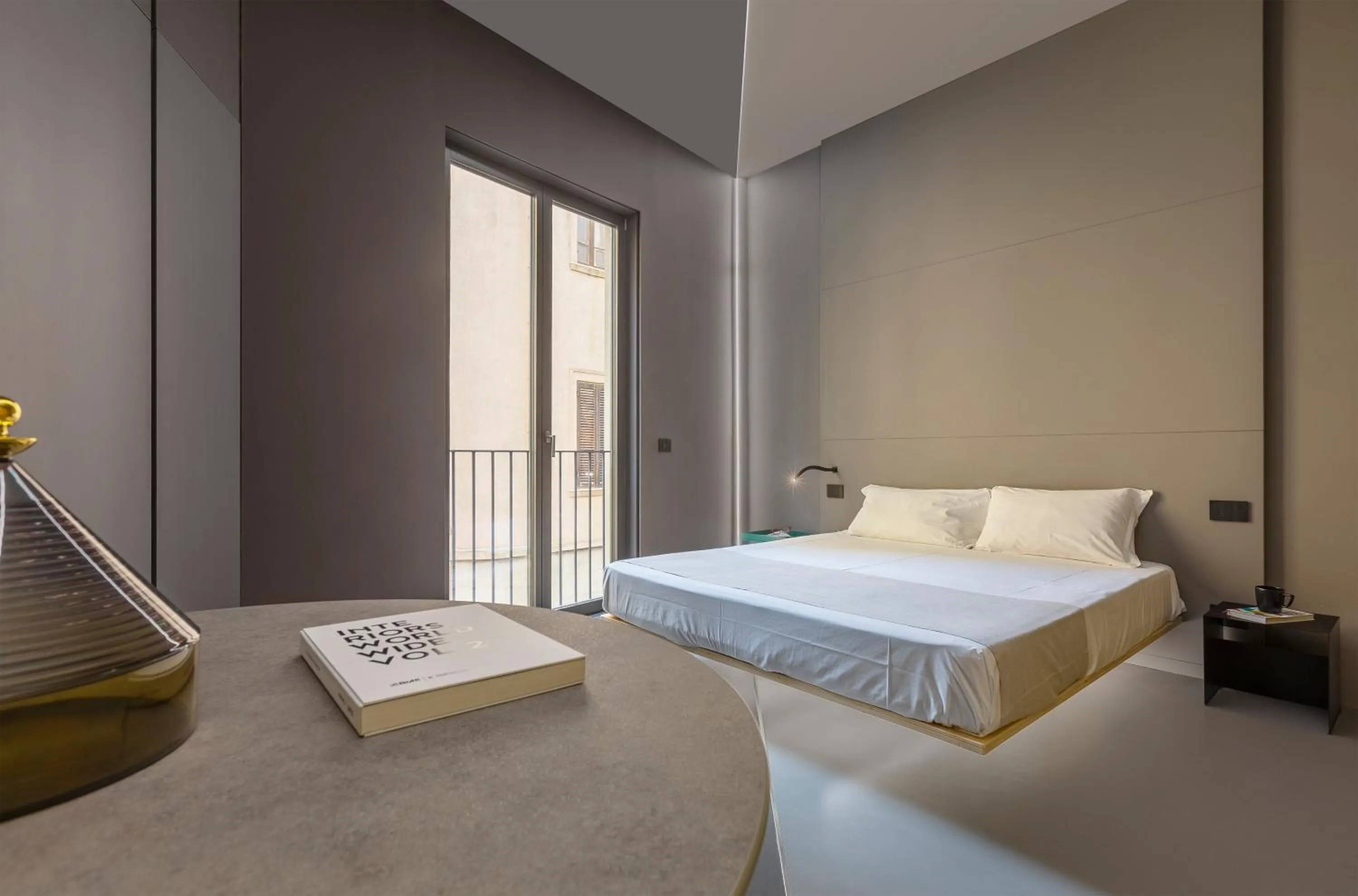 Bed in Fiveplace Design Suites & Apartments