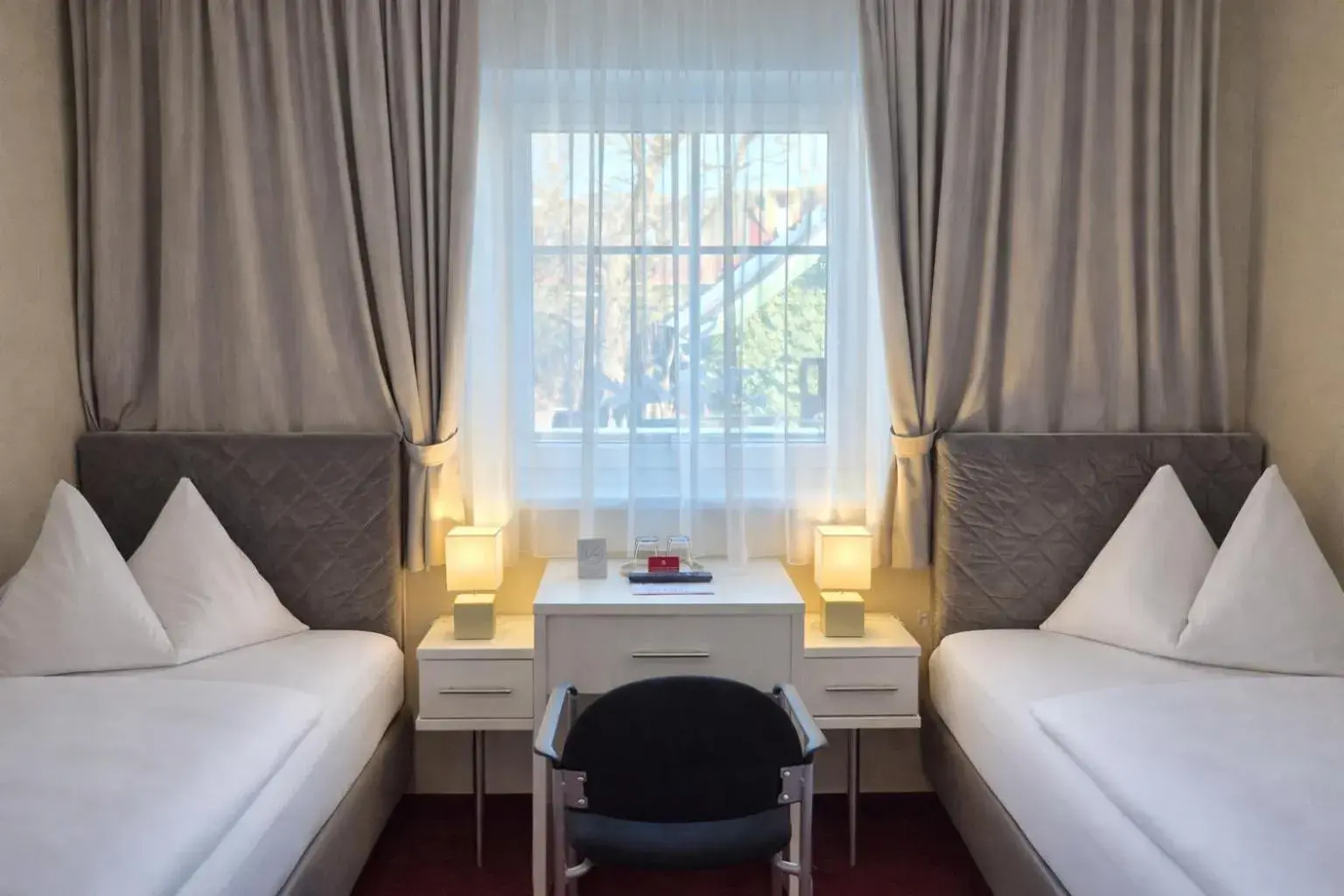 Small Twin Room - single occupancy in Stadthotel Kramer Small Twin Room - single occupancy in Stadthotel Kramer
