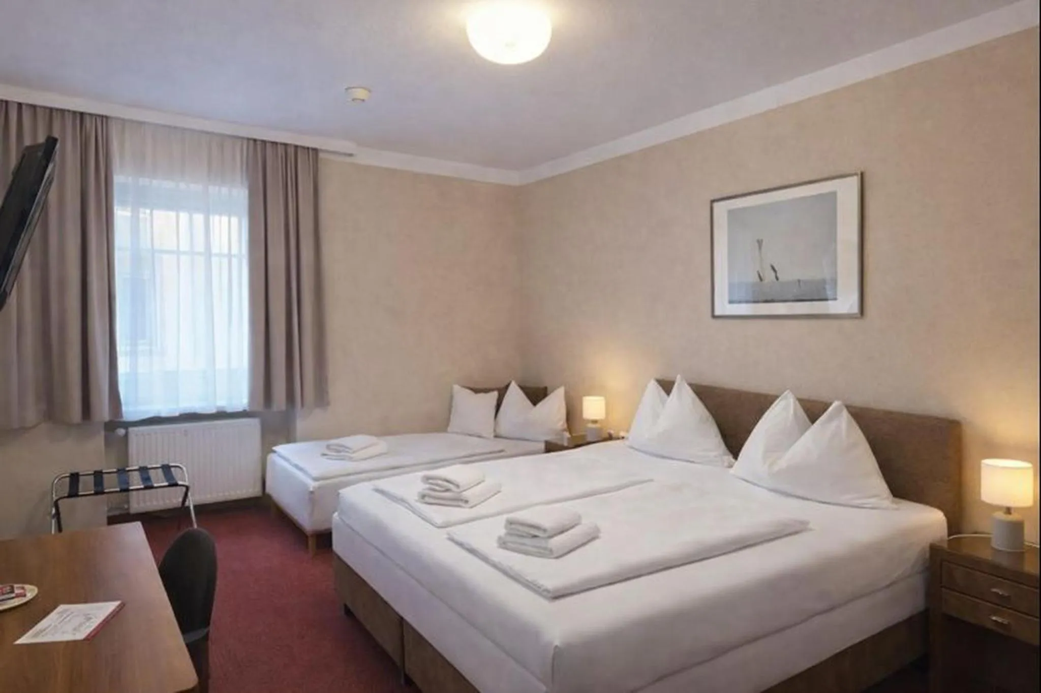 Bed in Stadthotel Kramer