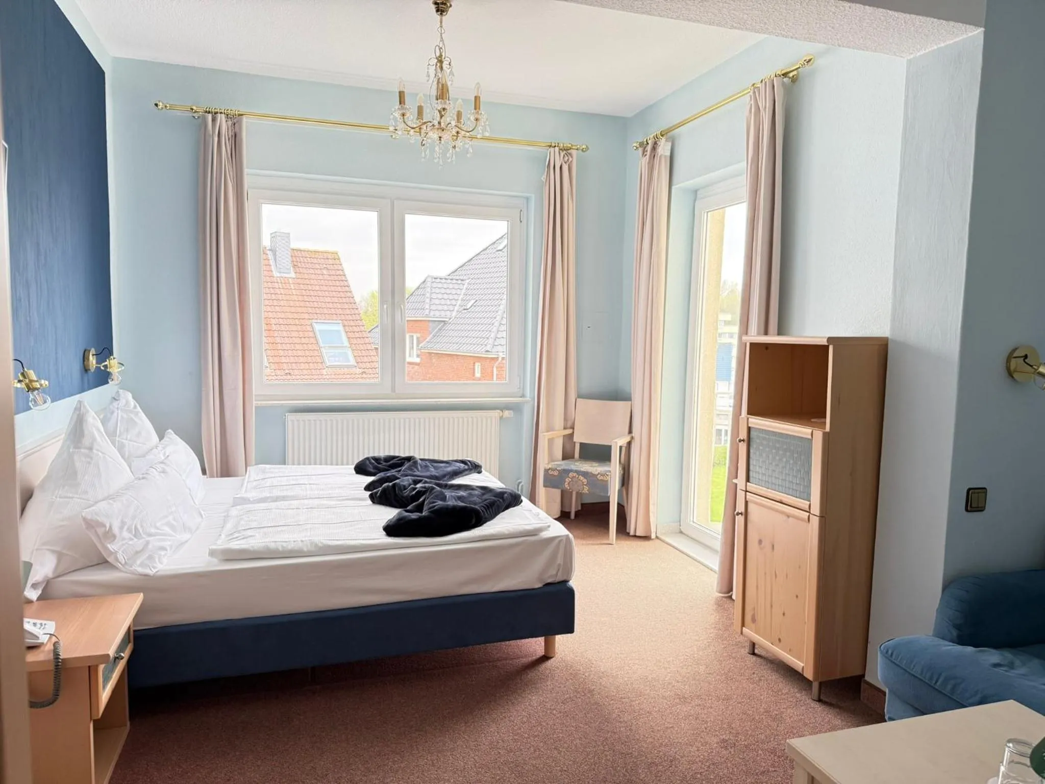 Photo of the whole room, Bed in Seehotel Neue Liebe