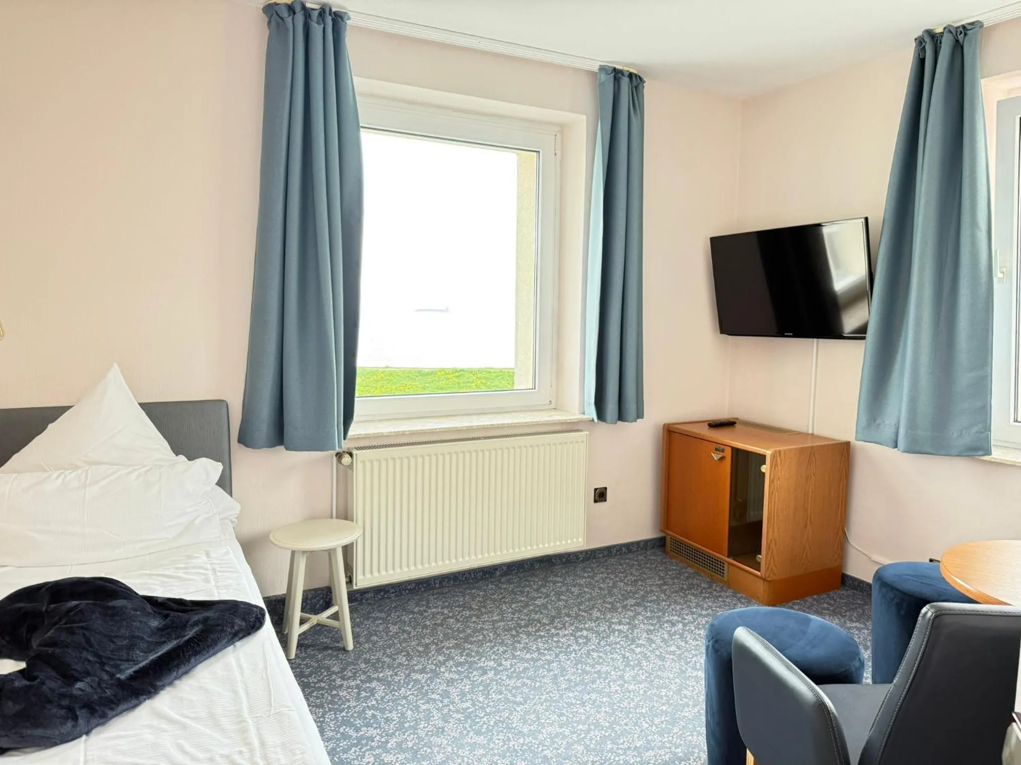 Photo of the whole room, Bed in Seehotel Neue Liebe