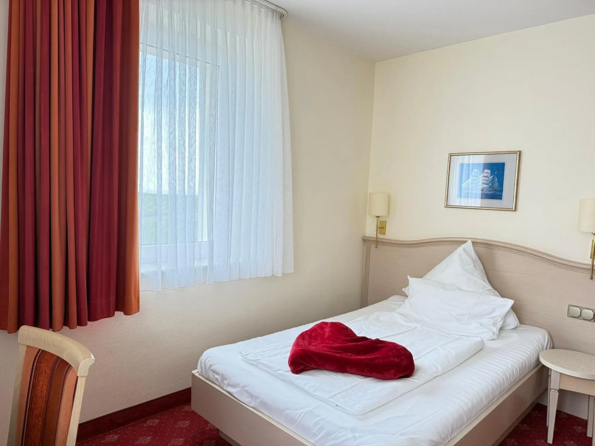 Photo of the whole room, Bed in Seehotel Neue Liebe