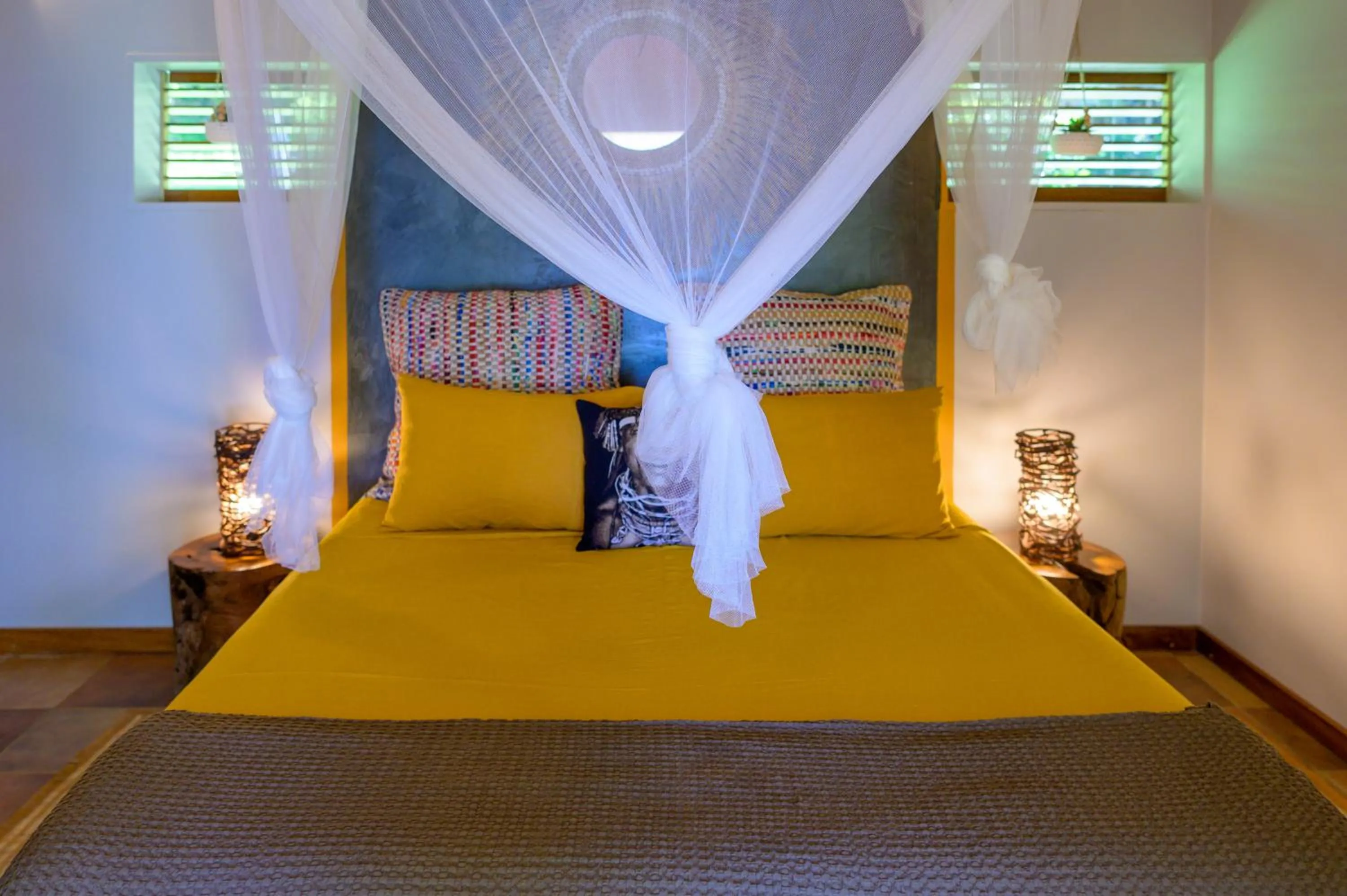 Bed in TropicAngel ECOLODGE de Charme