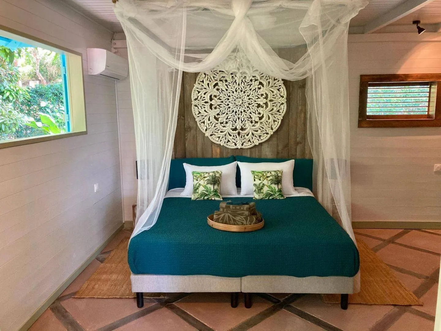 Bed in TropicAngel ECOLODGE de Charme