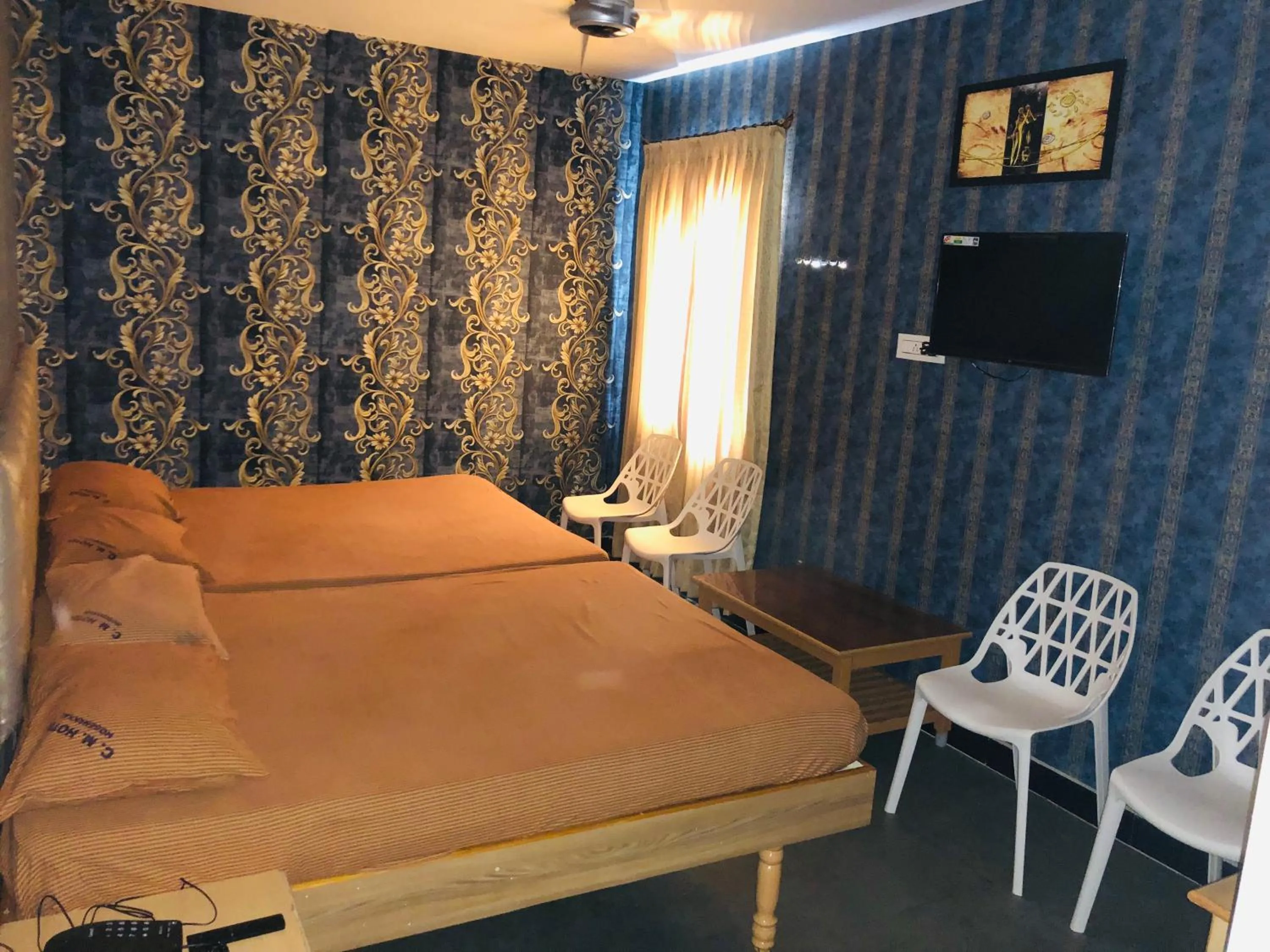 Bed in C M HOTEL NEW