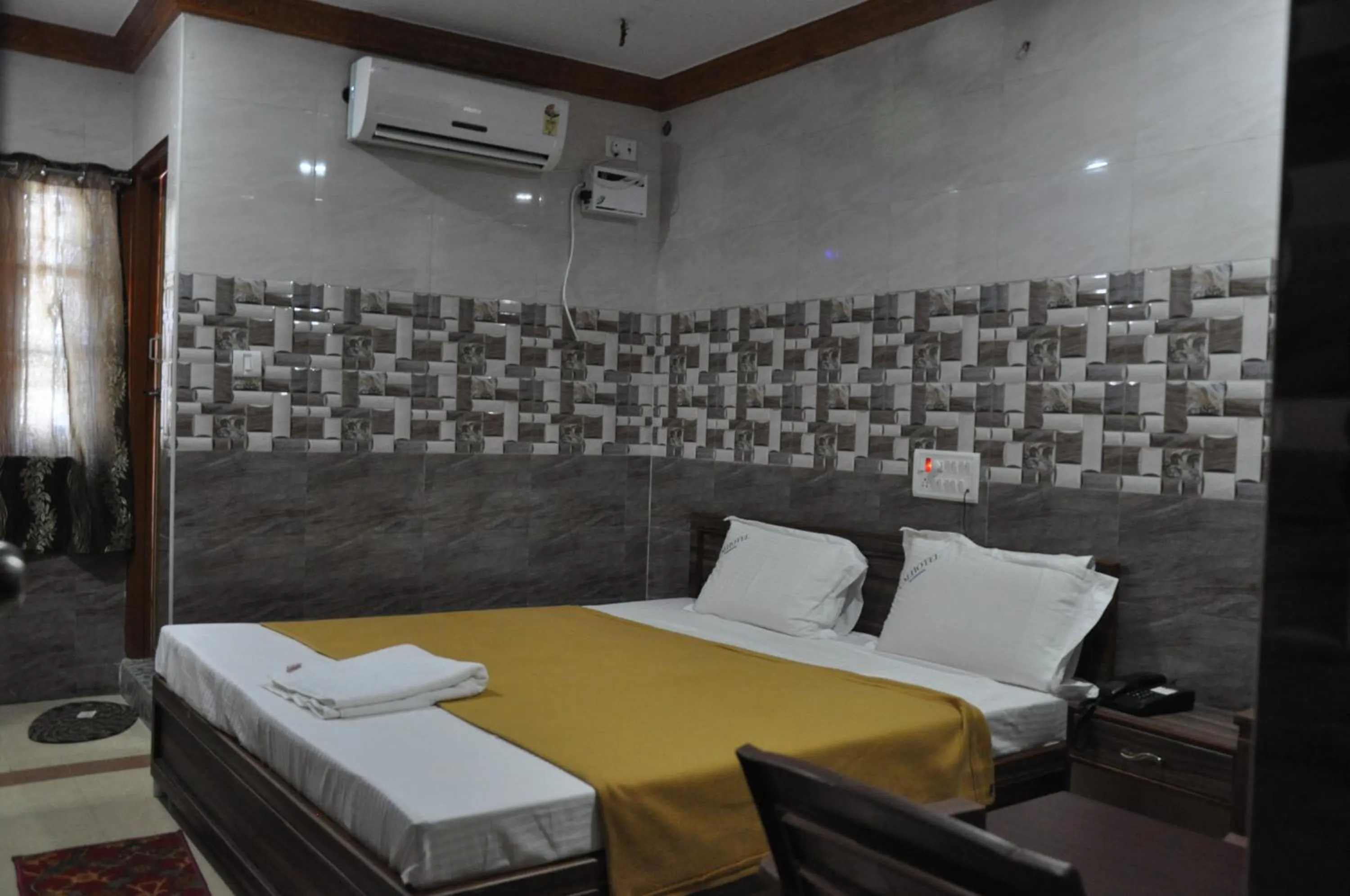 Bed in C M HOTEL NEW