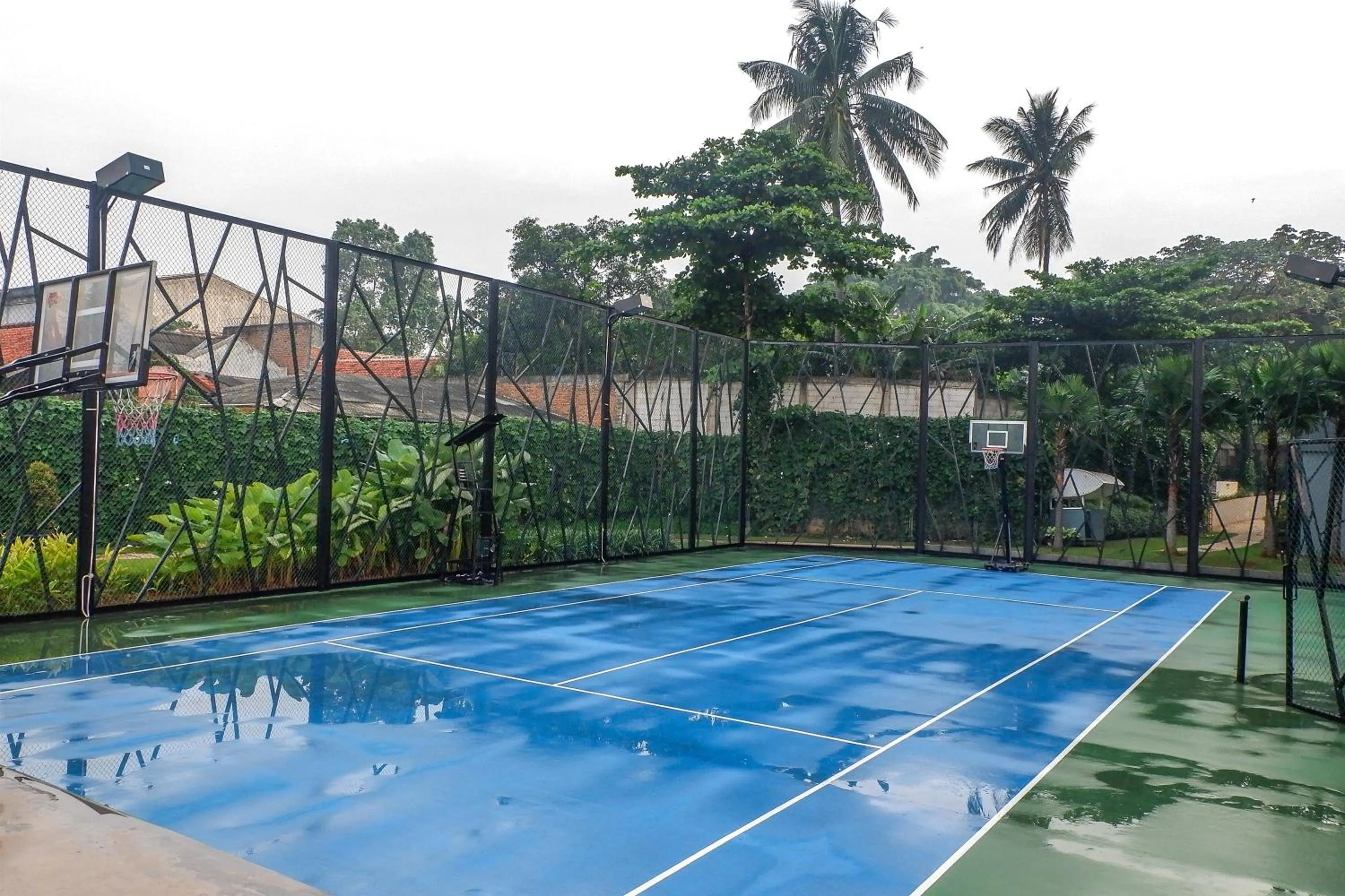 Tennis court in Brand New 2BR L'Avenue Apartment By Travelio
