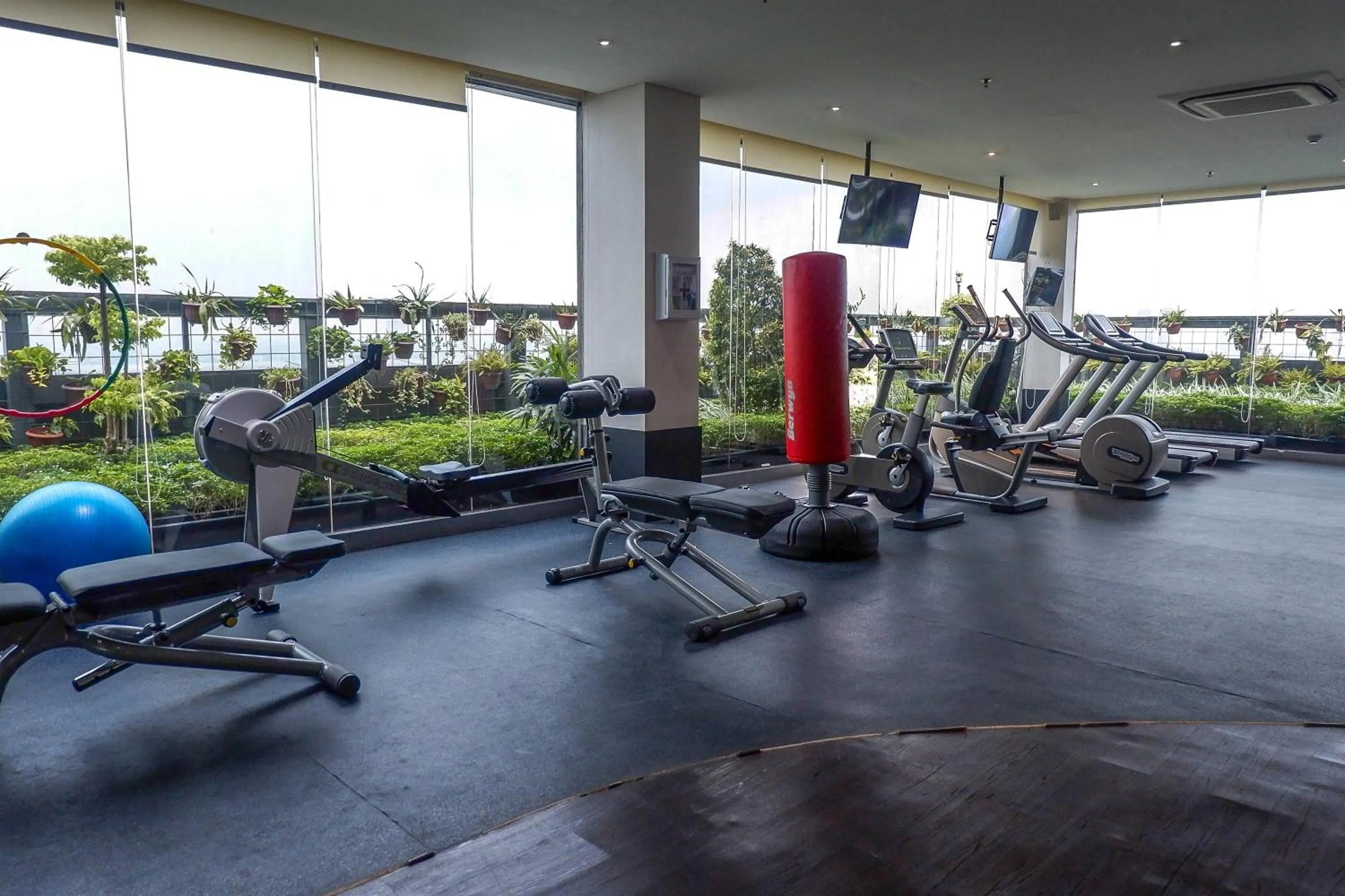 Fitness centre/facilities in Brand New 2BR L'Avenue Apartment By Travelio