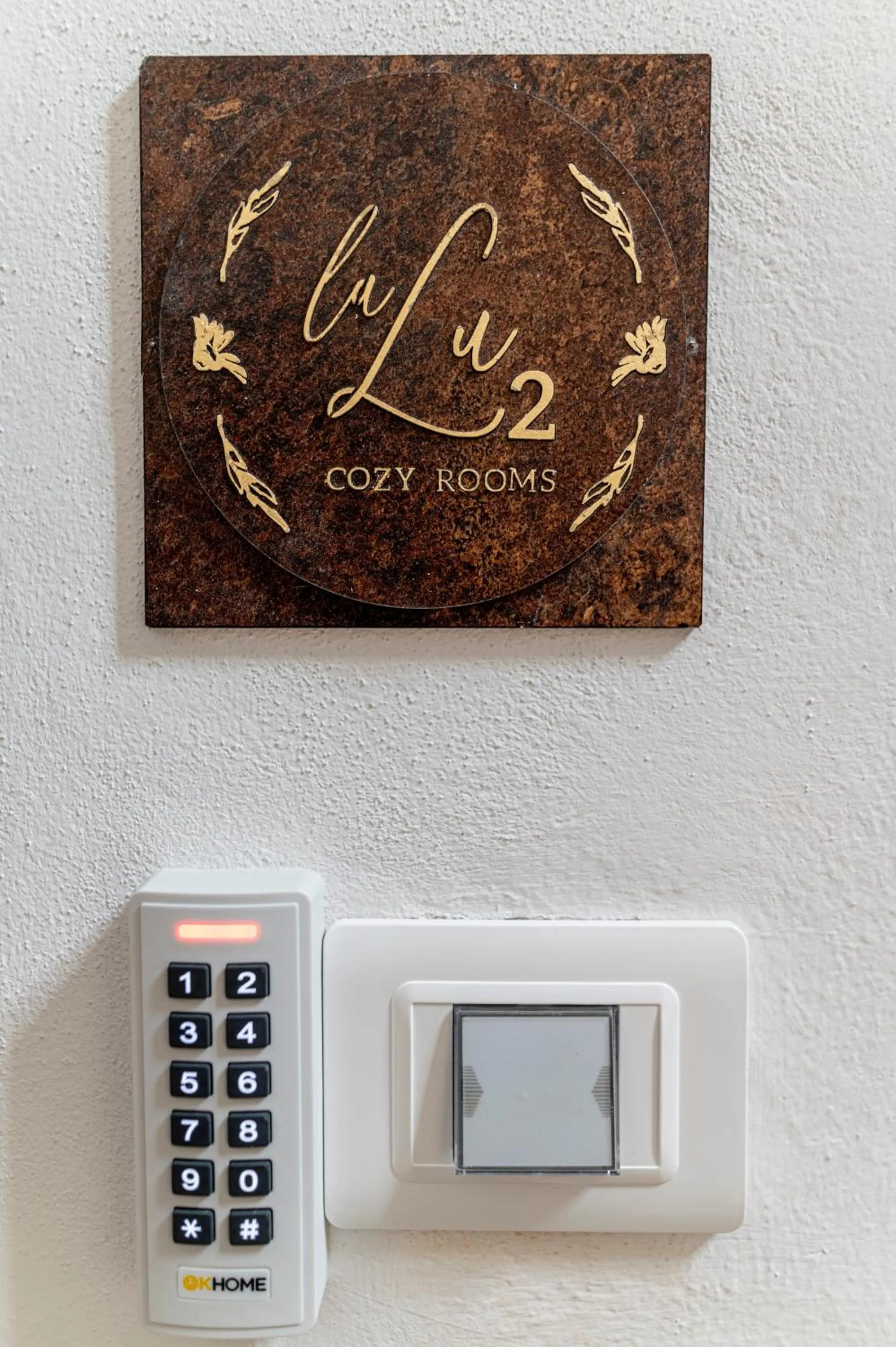 Property logo or sign in La Lu cozy rooms 2